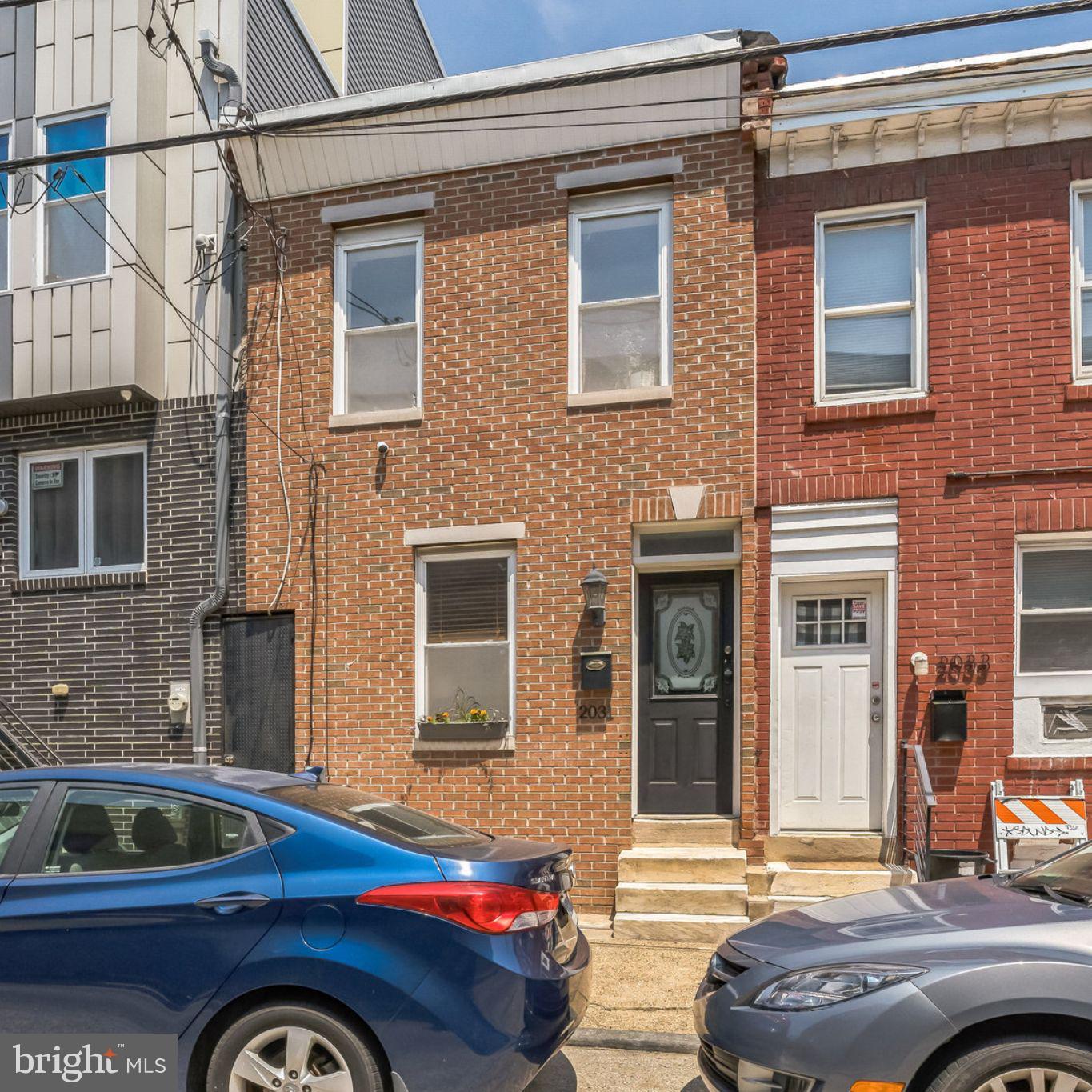 Welcome to 2031 E. Letterly Street—ideally situated in East Kensington with Fishtown just steps away! Surrounded by local favorites like OG Pizza, Philadelphia Brewing Company, Post Haste, and Thunderbird Salvage, you’ll love the walkability and vibrant energy of this neighborhood.
This move-in-ready home offers charm, flexibility, and space to make it your own. A classic brick façade sets the tone, and inside you’ll find a sun-soaked living room with hardwood floors and an open-yet-defined layout. The staircase creates a natural separation from the large eat-in kitchen, which features ample cabinetry, full-size appliances, and room for a dining table. Sliding glass doors open to a deep backyard—complete with space for a grill, lounge seating, and even a patch of grass.
Upstairs, the vintage-inspired full bathroom features a clawfoot tub with shower, vanity, and great light. Two well-sized bedrooms await—one with frosted glass doors and hardwood floors, and the other with double front windows, a generous closet, and ceiling fan.
Need storage? The full basement has you covered. And when it's time to head out, you're just a quick walk to the Frankford El and minutes from I-95.
Don’t miss your chance to own a beautiful home in one of Philly’s most exciting neighborhoods—schedule your showing today!