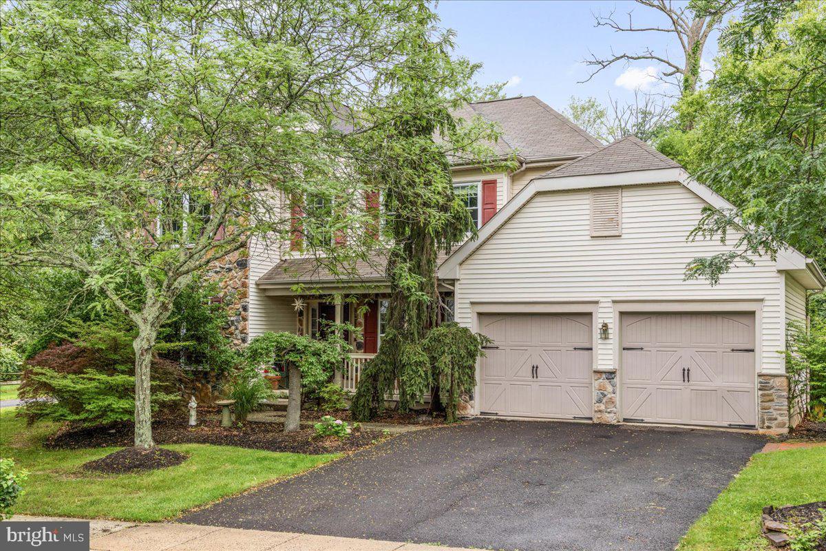 Welcome to this beautifully maintained 4-bedroom, 2.5-bath home located in the highly desirable Peddlers View community in the sought-after New Hope-Solebury School District. Set on a landscaped lot with mature gardens, this home blends classic charm with modern updates, and a versatile layout perfect for everyday living and entertaining.
The main level features rich wood floors throughout and a thoughtfully updated kitchen with soapstone countertops, butcher block topped center island, stainless steel appliances, and a sunny breakfast area. The kitchen flows effortlessly into the inviting family room, where a cozy wood-burning fireplace creates a warm and welcoming gathering space. Step through sliding doors to the rear deck and patio, ideal for outdoor dining and enjoying the peaceful garden views.
A formal dining room provides an elegant setting for special occasions, while the adjacent living room—currently used as a music room—offers flexibility to suit your needs. A convenient powder room and a spacious laundry room with access to the oversized two-car garage complete the first floor.
Upstairs, the expansive primary suite offers a relaxing retreat with a walk-in closet and an updated en-suite bathroom featuring a double vanity, soaking tub, and custom tile shower. Three additional bedrooms and a full hall bath offer ample space for family or guests.
Additional highlights include a large unfinished basement with great potential, and a detached shed previously used as an artist’s studio—perfect for creative pursuits, a home office, or workshop.
This exceptional home in Peddlers View offers timeless appeal, space to grow, and a prime location close to schools, shopping, and dining. Peddler's View is around the corner from the beloved Peddler's Village with its many shops and eateries. New Hope is less than 5 miles away; the center of Doylestown is a 13 minute drive.