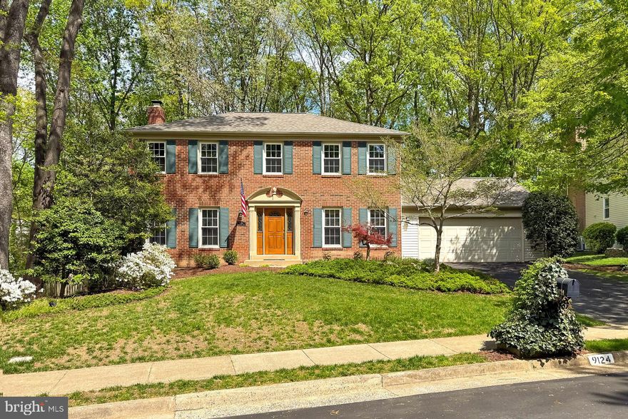 Welcome to this superbly maintained, almost 3,000 sq ft of living space on just under a quarter of an acre, 4 bedroom, 2 bathroom, 2 powder room home.  With a stately colonial exterior, this home is situated on a quiet street in the Lakewood Hills neighborhood. 
Professional landscaping and a beautifully hardscaped front walkway lead you to the front door where you are greeted by warm hardwoods that sprawl throughout much of the main level.  The center hallway is flanked by a delightful formal living room with crown moldings, and a spacious formal dining room, with an elegant chandelier and crisp moldings on the other side.  Oversized windows flood the spaces with natural light and beckon you to the eat-in kitchen space that provides access to the lovely deck with serene wooded views beyond.  The kitchen has been thoughtfully renovated and is inclusive of an abundance of beautiful custom solid hardwood cabinetry topped with gleaming granite countertops, a custom tile backsplash and top of the line stainless steel appliances.  This kitchen is a chef's delight with plenty of room for prep and entertaining.  The cozy family room exhibits a brick surround fireplace with mantle and a fabulous bay window with seating for those peaceful moments. A 2 car garage, coat closet and powder room complete with wainscoting round out the first level of the home.
Upstairs you will find the primary suite with a walk in closet and spa-like en-suite bathroom.  3 additional spacious bedrooms, each with plush carpeting, great lighting and good closet space, share the beautifully appointed hallway bathroom.
The lower level of the home provides a wonderful retreat with a large, finished recreation room, complete with a powder room, some great storage and a new sliding door that grants access to the patio and gorgeous yard beyond.  Back inside, a large laundry center with tons of storage, including a cedar closet and a bonus space completes the lower level of this truly spectacular home.  

If you're looking for a meticulously maintained residence in a convenient location; you've found it and welcome home!

Easy access to Fairfax County Parkway, Burke VRE, Springfield metro, Huntsman Park, Huntsman Lake, playground, basketball courts, wooded walking trails throughout the neighborhood, Huntsman Shopping Center.  
Orange Hunt, Irving, West Springfield school pyramid.