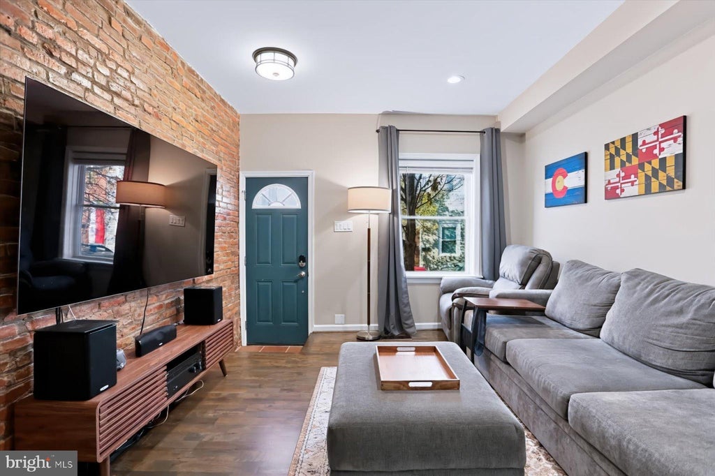 Photo of 103 N Curley Street, BALTIMORE, MD 21224 (MLS # MDBA2236264)
