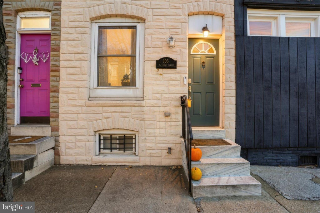 Photo of 103 N Curley Street, BALTIMORE, MD 21224 (MLS # MDBA2236264)