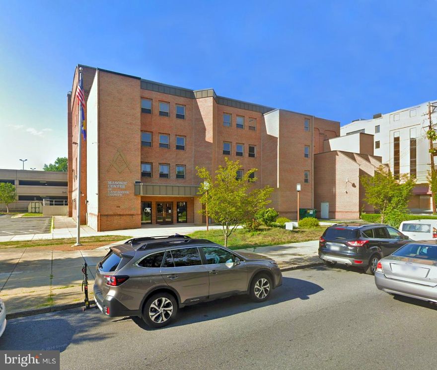 Nestled in the vibrant heart of Lancaster City, the Masonic Center offers an unparalleled opportunity for investors and developers seeking a property with exceptional visibility, walkability, and accessibility to downtown amenities, businesses, and attractions. This well-maintained structure stands out with 40 dedicated on-site parking spaces—a rare amenity in the city—supplemented by additional public parking in the adjacent Water Street Garage. Zoned Commercial Central Business (CB), the property is ideally suited for a wide array of commercial, institutional, or mixed-use developments, including offices, event venues, and educational facilities. Located within a LERTA zone, it provides significant property tax abatements on improvements, making it especially attractive for those seeking long-term value. The site’s placement in the Heritage Conservation District ensures that any development will harmonize with Lancaster’s rich architectural and cultural character. With a distinguished civic presence and historical significance—President James Buchanan was a member of this Lodge—the Masonic Center delivers a dignified setting for professional, civic, or cultural organizations.