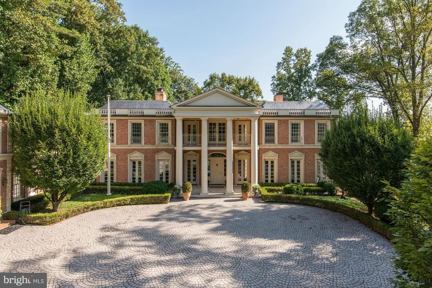 NEW PRICE! Stately, gated residence on McLean's sought after Gold Coast. Wonderful, flexible floor plan w/ generous room sizes, floor to ceiling windows, renovated gourmet kitchen & family room. Luxurious master suite w/ sitting room, updated his & her baths, grand entertaining spaces, stone terrace, large rear & side yard w/ patio, generous lower level. Seasonal river views. Parking for 20+ cars.