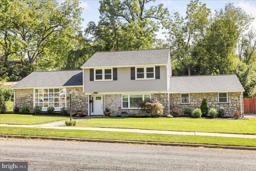 Welcome to this completely renovated home, situated on a large, oversized lot with a freshly landscaped, fenced-in backyard, perfect for outdoor activities and privacy. The first floor features a spacious foyer with a double-door coat closet, ideal for welcoming guests. There's a versatile room that can serve as an office, a full bathroom, and a convenient laundry room equipped with a utility sink. The laundry room also offers direct access to the attached 2-car garage, which includes a mini-split system for climate control.
The brand-new kitchen is a chef’s dream, boasting quartz countertops, stainless steel appliances, and a stylish tile floor. It seamlessly flows into the living and dining areas, making it perfect for entertaining.
The primary bedroom is a true retreat, featuring beautiful wood floors, a barn door leading to a walk-in closet, and an en-suite bathroom. The primary bathroom is luxuriously appointed with a double sink vanity and an oversized walk-in shower with a tile surround, rain shower head, and handheld wand for a spa-like experience. Two additional bedrooms on this floor share a thoughtfully designed Jack and Jill bathroom, complete with wood floors, ample closet space with built-in shelving, and a black walnut countertop. The bathroom includes a walk-in shower with a tile surround, blending functionality with elegance.
This home is equipped with an all-new 400-amp electrical service, a gas tankless water heater with a booster for enhanced water pressure, and modern PEX plumbing. The exterior has been updated with a new roof, windows, and siding, ensuring durability and curb appeal. Additional storage is available in the backyard shed, making this home as practical as it is beautiful. This property is a must-see for those seeking a modern, move-in-ready home with top-of-the-line features.