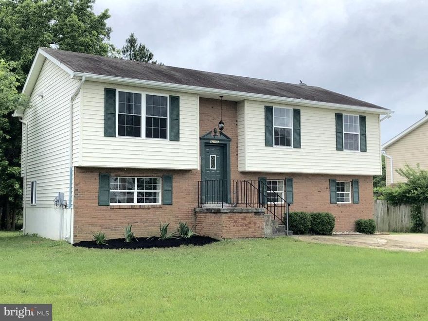 Great and Convenient Location! This Spacious Split Foyer Home Features: 3 BRs & 3 baths, large MBR with new bathroom, walk-in closet, open kitchen to LR & DR with granite counter tops, SS appliances, new cabinets and wood floors. Finished lower level with the 3rd bedroom, family room, full bath & wood floors throughout. New heat pump, all new light fixtures and new washer and dryer.