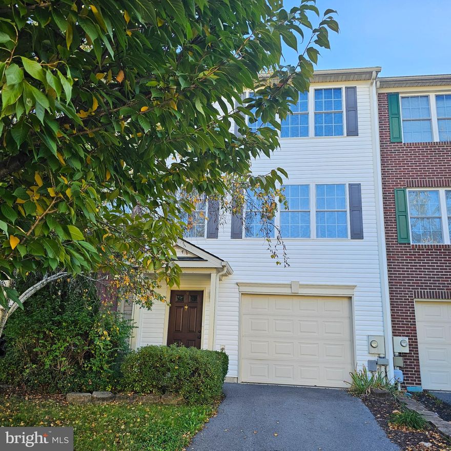 AVAILABLE NOW.  Three finished levels, very neat and clean - nice townhome in Hammonds Mill at exit 20 in West Virginia at the Spring Mills exit. Has 3 bedrooms on the upper level with 2 full baths. Main level has living room, dining area and kitchen, lowest level has garage and recreation room. Back opens to patio on the lower level and large deck on the main level. There is driveway parking space. Very nice community in North Berkeley County. No Smoking and pets case by case.