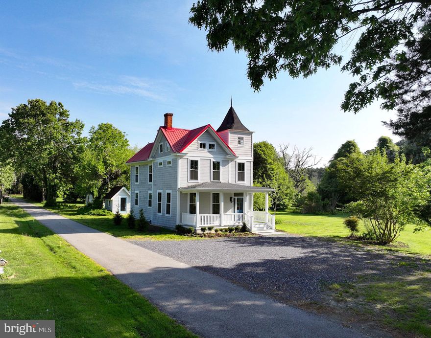 What a transformation this Victorian beauty has undergone! With high ceilings, new windows, and gorgeous engineered wide plank wood floors, the downstairs is open and light. A stylish kitchen with island  overlooks the dining area and large sliders open  to a private side yard, where glimpses of nearby Harris Creek may be seen.  The front room  provides a comfortable seating area. Upstairs are three bedrooms and three new tiled baths, plus a separate laundry room. All just minutes to St. Michaels!