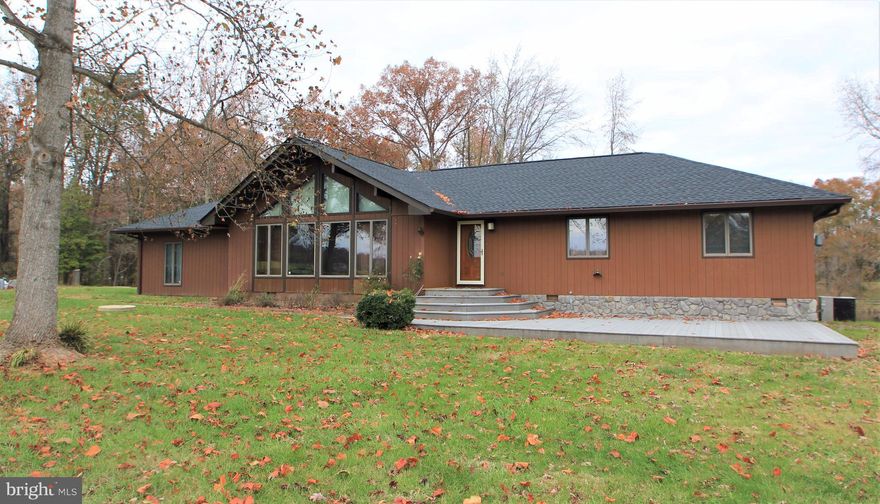 Horse Property for Rent! Newly Refurbished Inside and Out. Spacious Open Floor Plan with Large Family Room with Wood Burning Fireplace. Private Master Suite with Walk-in Closet and Luxury Bath. Rear Deck Overlooks Large Bass Filled Stocked Pond. Large Circular Paver Stone Patio with Fire Pit. 4 Stall Barn with Electric & Water. No HOA!