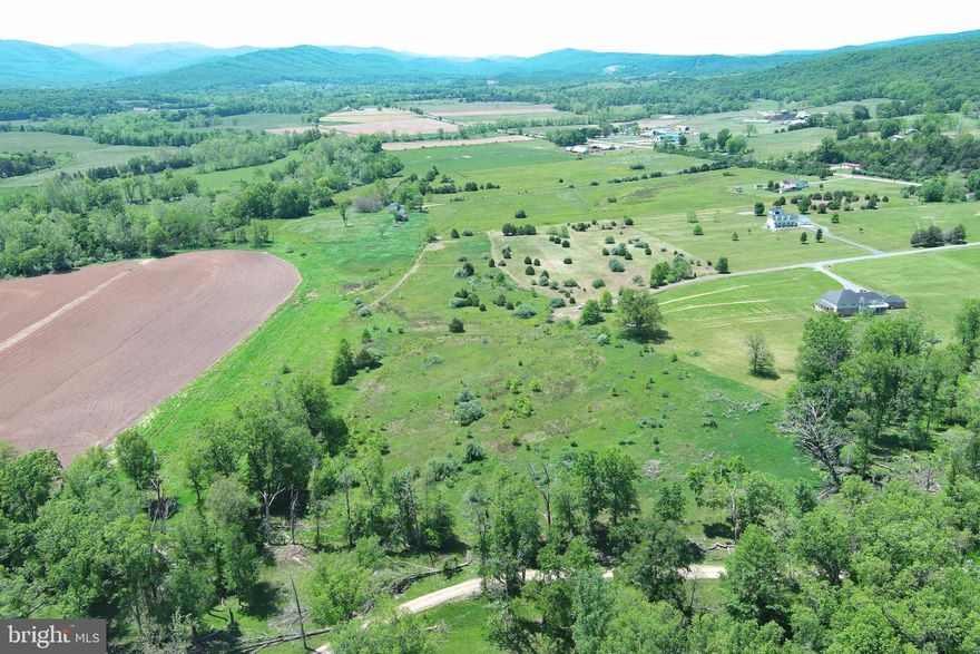 THE NEW GATEWAY TO THE WEST.....100 MILES FROM THE WHITE HOUSE YOU'LL FIND THE NEW GATEWAY TO THE WEST....WARDENSVILLE, WV.....A BOOMING ARTISAN VILLIAGE SURROUNDED BY THE GEORGE WASHINGTON NATIONAL FOREST, TROUT STREAMS & NATURAL BEAUTY. THIS 15.79 ACRES IS COMPRISED OF LOTS 3 & 4 IN THE SMALL UPSCALE 6 LOT DEVELOPMENT KNOWN AS "THE HIGHLANDS" CONVENIENTLY LOCATED 2 MILES NORTH OF WARDENSVILLE, ONLY 1/4 MILE OFF RT 259. SITUATED IN THE CACAPON RIVER VALLEY, THIS LAND OFFERS INCREDIBLE VIEWS AND IS BORDERED BY A RIVER BOTTOM FARM, PROVIDING A PEACEFUL & PRIVATE BUFFER. WET WEATHER UNDERGROUND SPRINGS PROVIDE EXCELLENT POTENTIAL SITES FOR LARGE PONDS. HOP ON THE 4 LANE HIGHWAY IN WARDENSVILLE AND BE AT SKI RESORTS IN LESS THAN AN HOUR, 5 MINUTES FROM WARDEN LAKE & CACAPON RIVER ACCESS.....MULTIPLE OUTDOOR PURSUITS AT YOUR FINGERTIPS. THIS LAND IS WORTHY OF A TROPHY HOME, A PLACE TO CALL YOUR OWN......IN ALMOST HEAVEN!