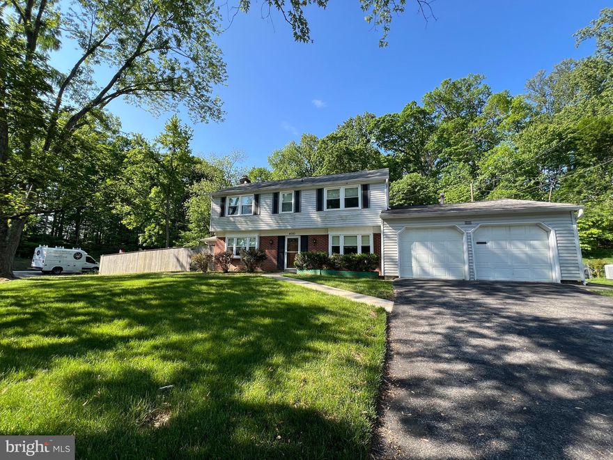 Welcome to 4000 Welsley Lane in charming Bowie, MD! This unique home is a delightful journey back in time, bursting with character and ready for your modern updates. Spanning over 2,500 square feet on an impressive large corner lot, this property provides ample space inside and out. 

This 4 bedroom, 2 full bath Bowie colonial is ready for your personal touch and imagination. Featuring a spacious kitchen, along with distinct dining and living rooms, this home provides an abundance of space for all your needs.

The expansive addition transforms the living experience with its own private bedroom, complete with a full bath and a spacious kitchen. This addition also boasts a separate laundry area, HVAC system, and water heater, ensuring privacy and convenience. The separate enclosed patio and private entrance make it feel like a home within a home, perfect for guests, in-laws, or even a rental opportunity.

Car enthusiasts and hobbyists will appreciate the two-car garage featuring a dedicated workspace. It's the perfect spot for tackling projects, whether you're into cars, crafts, or gardening.

Enjoy the charm and originality of this home’s unique layout while envisioning the possibilities. Whether you're looking to add your personal touch or seeking a property with income potential, 4000 Welsley Lane is a rare find that offers flexibility and opportunity in a wonderful location.

Come explore this timeless treasure and imagine the future it holds for you!