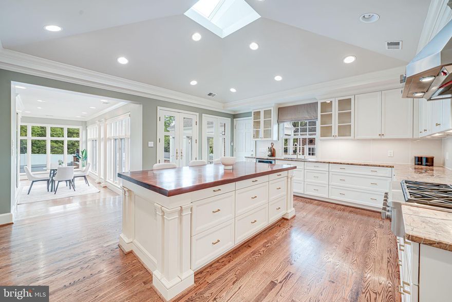 Welcome to this gorgeous property and one of the most versatile homes on .83 acres in the city of Alexandria! From entertaining on the slate patio and open-air outdoor dining room with a grilling/kitchen station to enjoying huge, fully-fenced backyard and beautifully-landscaped front yard, your guests will have ample space for a night of celebrations. It will be difficult to tear yourself away from this amazing space! But you won’t want to miss the interior of this house complete with gleaming hardwood floors, 3 wood-burning fireplaces, built-in bookshelves in multiple rooms, exquisite double crown molding, and stunning views of the backyard. Imagine hosting dinners in the front dining room or curling up with a good book next to a roaring fire in the study. The expansive kitchen beckons you to pour a drink while cooking a delicious meal to share with family and friends. Enjoy tons of cabinet storage as well as a large island ideal for entertaining. Other kitchen features include a skylight, two ovens with one that doubles as a microwave, a new three-tier dishwasher, a built-in TV, a panel ready refrigerator, brand new hardware on the cabinets, and a brand-new faucet on the sink. Need more storage or prep space? This house has you covered with a great butler’s pantry! Several cupboards and a wine cooler will keep you well-stocked and ready for a party. Across the foyer, a small flight of stairs leads to two large bedrooms as well as a Jack and Jill bathroom. Another full hall bath is convenient for residents and guests alike! Head to the back of the main level to see the absolutely stunning great room complete with French doors leading out to the backyard. Imagine hosting or relaxing here with a great view of green trees and grass in the summer or falling snow in the winter with a crackling fire in the background! And if that isn’t enough, walk through another pair of interior French doors to find the sublime sunroom lined with windows for a wealth of natural light! The perfect location for weekend brunch with friends! And when you find the need to escape to your own private retreat, the upper-level primary suite invites you with beautiful vaulted ceilings and serene views of the backyard via French doors leading to a Juliet balcony. You won’t lack for storage, either, with three closets in the primary suite. This property is incredible. Don’t wait! Come see it for yourself today! 2 new HVAC systems with smart thermostats; new water heater; new boiler; new dishwasher; new lighting in dining and sitting room; new fence (2024).