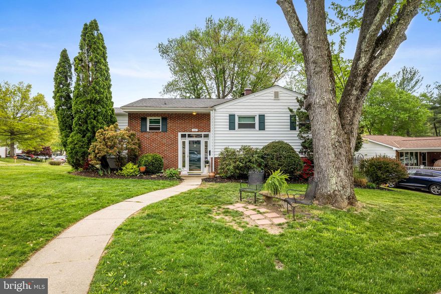 Nestled in the Woodwind neighborhood, backing up to Patapsco State Park and near Rollingwood Pool, this split-level home sits on a spacious corner lot on a quiet dead-end street. The upper level features a spacious living room with a wood burning fireplace, an extended kitchen with a bay window, and dining room with sliders leading to a large deck overlooking the backyard.  Three bedrooms and one bath complete this floor, with original hardwood floors in the dining room and two bedrooms.  The lower level offers plenty of flexibility, featuring a fourth bedroom, a full bath, two generous living areas, and utility and storage rooms.  A slider leads from the lower level to the rear yard.  Easy access to 695, 95, DC, Baltimore, and BWI make this location hard to beat.
