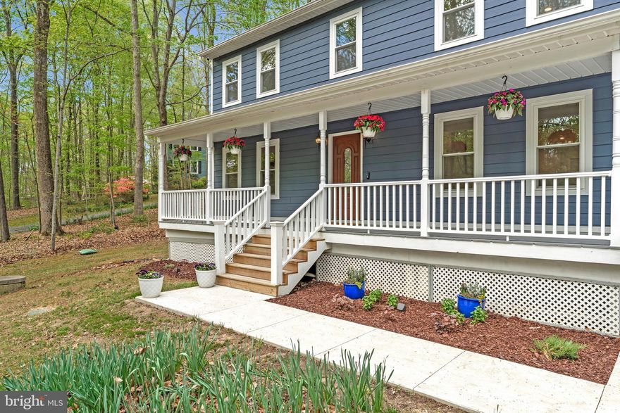 Welcome to Windsor Estates — a quiet, wooded neighborhood with no HOA and over an acre of serene privacy. This beautifully updated home offers abundant storage with a two-car garage, shed, and expansive basement. Outdoor living shines here with a large fenced-in yard surrounded by mature trees providing plenty of shade during summer months. Enjoy gatherings and recreation with a basketball court, outdoor shed, hot tub, large concrete driveway, spacious deck, and BBQ area, perfect for entertaining.

Inside, you’ll find a stunning kitchen renovation (2025) featuring beautiful quartz countertops, a pot filler, gas range, stainless-steel appliances, and tons of cabinetry for storage. The bright Florida room, located off the kitchen, includes a NEW mini split system (August 2025) for year-round comfort and makes a wonderful space for relaxing. The spacious laundry/mudroom remodel (2022) also features quartz countertops, ample cabinets, a utility sink, and workspace, making everyday tasks a breeze.

The elegant primary suite includes a beautifully updated bathroom with a large soaking tub, and a walk-in closet plus additional closet space for plenty of storage. Secondary bedrooms are bright and stylish, with fresh paint and custom lighting that create a warm and inviting atmosphere. All bathrooms have been beautifully updated, including the primary bath, hall full bath (October 2025), and powder room (2022). Modern features include Haiku Smart fans and dual-zone HVAC system (2017), a Ubiquiti camera system, and setup to install EV charger for added convenience.

The finished basement offers a dedicated office and den area, along with a large storage and mechanical room, providing flexibility for work, recreation, and organization. Extensive updates make this home truly turnkey: Hall bath renovation (October 2025), chimney crown replacement (October 2025), chimney sweep and Level I inspection (September 2025), whole-house duct cleaning (September 2025), Comfenergy home insulation retrofit (August 2025), concrete driveway (July 2025), new flooring and carpet (June 2025), basement office renovation (2025) with custom cabinetry, whole-house generator (2024), new garage door (2024), tankless water heater (2020), Hardiplank siding (2019), new windows (2019), roof replacement (2017), and dual-zone HVAC system (2017).

Ideally located for commuters, this home offers easy access to I-95, public transit, Lake Ridge shops and restaurants, while being just a short drive from adorable Town of Clifton. Outdoor enthusiasts will love the nearby parks and the Bull Run–Occoquan Trail, perfect for hiking, fishing, and exploring nature. With thoughtful updates, modern technology, and a peaceful wooded setting, this Windsor Estates property combines comfort, style, and functionality all with no HOA and over an acre of tranquility.