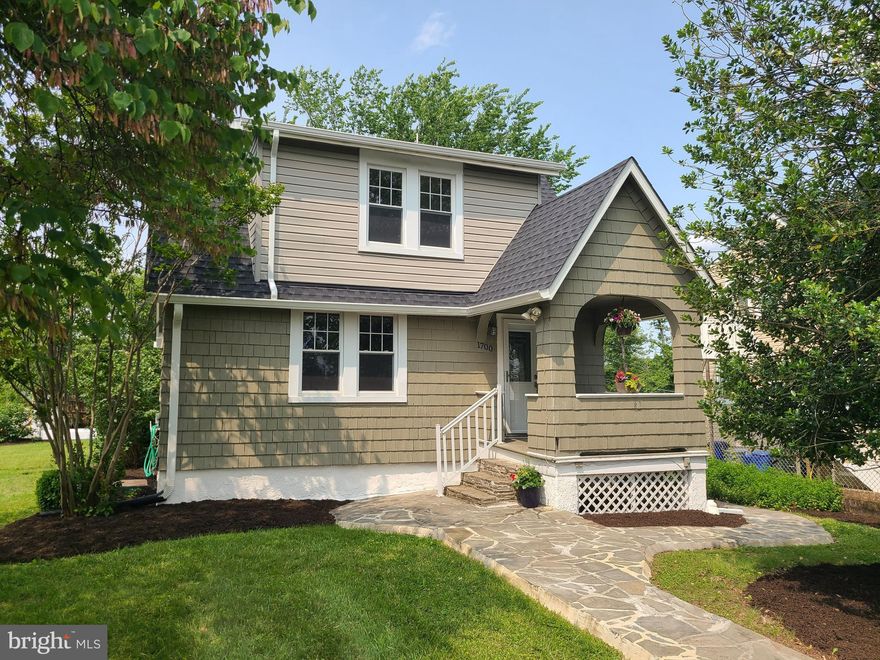 NEW PRICE. Welcome to 1700 Goodview Road! This charming porch front home has a lot to offer. Well maintained and move in ready 3 BR 1 BA Cape Cod on a very spacious corner lot. Recent updates include new roof and gutters (May 2025), interior freshly painted with neutral tones (May 2025), sealed driveway and landscaped (May 2025). 
Kitchen features white Shaker style cabinetry, gas stove, ceramic tile flooring, new kitchen faucet (2025), table space, and freshly painted with plenty of cabinet and counter space.
The separate dining off of the kitchen allows for easy meal planning. Spacious living room off of dining room, both rooms with hardwood floors and have been freshly painted. 
3 bedrooms upstairs all with hardwood floors and freshly painted. Bedroom 2 and 3 have extra closet space. Full bath off of the hallway with ceramic flooring and walls, new baseboard heater (May 2025). Pull down stairs in hallway for easy attic access.
The 22 x 22 basement offers plenty of extra storage space. Freshly painted throughout, exterior and interior access, built in shelving, full size washer and dryer, French drain and a sump pump with liberty pump water powered backup system.  
The 10 x 14 shed with windows, lighting and electric offers loads of storage for all your gardening or outdoor needs or it could serve as a workshop. The rear of home has an oversized driveway allowing parking for multiple cars. Also, plenty of street parking as it is a corner lot. 
Enjoy the entertaining areas of the outdoor space, very nice large flat front and back yards. Step out to the cozy covered rear porch off of the kitchen ideal for sipping coffee in the morning. Gardeners will love the many  flower beds.   
All nestled on a quiet tree-lined street in the heart of Parkville. Moments from parks, shopping, restaurants, and more. Convenient location and short distance to I-695 and major routes.