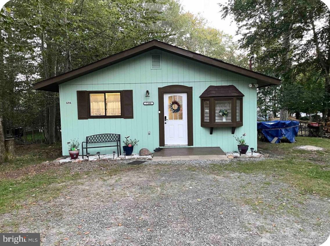 Beautiful ranch house in 24/7 gated community - A Pocono County Place. Features 3 bedrooms and 1 bathroom, kitchen and living/dining space. Outdoor features include a flat grassed lot, with front space for parking. Community amenities includes pool, beaches, tennis court, playground and club house. Short rental are permitted. Low taxes! For sale by owner. Call today to schedule a showing (by appointment only).
