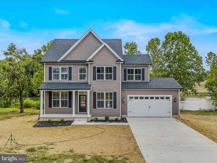 Brand-New 2025 Construction with Stunning Water Views
Welcome to your dream home in the desirable Howard Speaks community! Perfectly positioned to overlook the serene community lake and golf course, this brand-new home offers incredible views paired with exceptional craftsmanship and style.

Step inside to find a thoughtfully designed layout featuring 9-foot ceilings, elegant luxury vinyl plank flooring on both levels, and trendy, modern light fixtures throughout. The heart of the home is the fabulous kitchen, boasting black slate appliances, a large quartz island, and 42-inch cabinetry—ideal for both everyday living and entertaining.

This home offers 4 spacious bedrooms and 2.5 baths, including a luxurious primary suite with dual walk-in closets and an exquisite primary bath with double vanity, spa like shower.

The walk-out basement is ready for your personal touch, featuring full-size windows, patio doors, and a rough-in for a future bathroom. Step outside to a private patio and soak in the peaceful water views.

With top-quality finishes, modern upgrades, and a prime location, this home is move-in ready and waiting for its first owner.