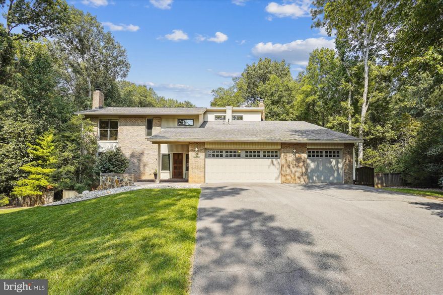 Discover this beautifully renovated contemporary home, ideally situated on a tranquil 1-acre lot in Oakton, VA. Featuring 4 spacious bedrooms and 2.5 bathrooms, plus a 3-car garage, this home blends modern luxury with everyday comfort. The main level boasts a chef-inspired kitchen with stainless steel appliances, including double ovens, a 6-burner cooktop, and a generous island — perfect for preparing gourmet meals and entertaining. The open-concept family room offers a cozy wet bar and two gas fireplaces, creating a warm and inviting atmosphere. A separate living room and dining room provide additional space for relaxation and hosting. The main level also includes a convenient powder room. Enjoy the abundance of natural light in the sunroom, or step outside to one of two expansive decks — one featuring a natural gas connection for effortless grilling and outdoor dining. Upstairs, you’ll find four well-appointed bedrooms and two full bathrooms, offering plenty of space. The large primary bedroom features a cozy sitting area and an oversized walk-in closet, while the luxurious primary bath includes heated floors for a spa-like experience. The fully fenced rear yard provides both privacy and space for outdoor enjoyment. Rent includes lawn care and pest control services, making life a little easier. Enjoy easy access to the scenic Cross County Trail, perfect for outdoor activities and nature walks. This home offers a true lifestyle of comfort, luxury, and convenience. Don't miss out — schedule your showing today!