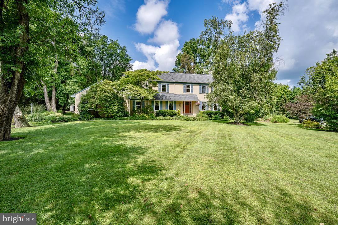 What better way to welcome Fall than by enjoying this stunning property with gorgeous trees that will soon shine with gold and red leaves! The level drive and manicured front yard invite you to enter and experience the beauty of this 2.3 acre property, screened in back with natural vegetation and tall trees, and thus creating a secluded oasis of lawn and mature landscaping highlighted by an amazing Willow tree! Situated on a quiet cul-de-sac in the award-winning T/E School District, this home offers the ambience of country living while being conveniently located close to wonderful shopping centers, easy access to major roadways, outstanding schools, and town centers on the Main Line. This traditional colonial has been lovingly maintained and updated with care, and offers a rare combination of privacy, space, and timeless charm, surrounded by manicured lawn, mature trees, and a park-like setting. Inside, you will find hardwood floors throughout, custom millwork as evidenced in crown molding and chair rails, unique and beautiful leaded glass windows that frame the front door, and a gracious floor plan that includes a formal Living Room with new lighting, an elegant Dining Room, and a bright Kitchen with breakfast area that opens to a screened porch. The Family Room is just steps away from the Kitchen and features a wood burning fireplace for cozy winter evenings. An added bonus is the Office which provides a room offering privacy and quiet. The Laundry Room and Powder Room complete the interior main floor, and the Screened Porch is a delightful indoor/outdoor living area, enhanced with skylights, that greatly expands the opportunities to enjoy the gardens and beautiful grounds. Continuing on the second floor, all four Bedrooms offer abundant natural light, and the Primary Suite features a walk-in closet and an updated Bath. The spacious Hall Bath serves the other three Bedroom.. Additional improvements include a new tankless Hot Water Heater (2023), top of the line Thermo Pride high efficiency Furnace (2015), roof replacement (2013), and construction of screened porch and deck (2013). All systems including chimney and septic system are serviced routinely on schedule and all are maintained with utmost care and diligence. Connection to public sewer is possible at back property line, and more details are available in the Sellers Property Disclosure. Additional highlights include a two-car Garage, large unfinished Basement, pull down stairs to partially floored Attic, and a large double door Shed with electricity that is ideal as a workshop or garden shed. A Kohler whole-house propane gas generator provides year-round peace of mind, and the propane tank is owned and belongs with the property. Located just minutes away Paoli Train Station, Wegmans, Great Valley, and all the shops and dining of the Main Line., this is a rare opportunity to live in a bucolic setting and also enjoy the many benefits of the surrounding communities. Make this wonderful property your new home for the holidays!