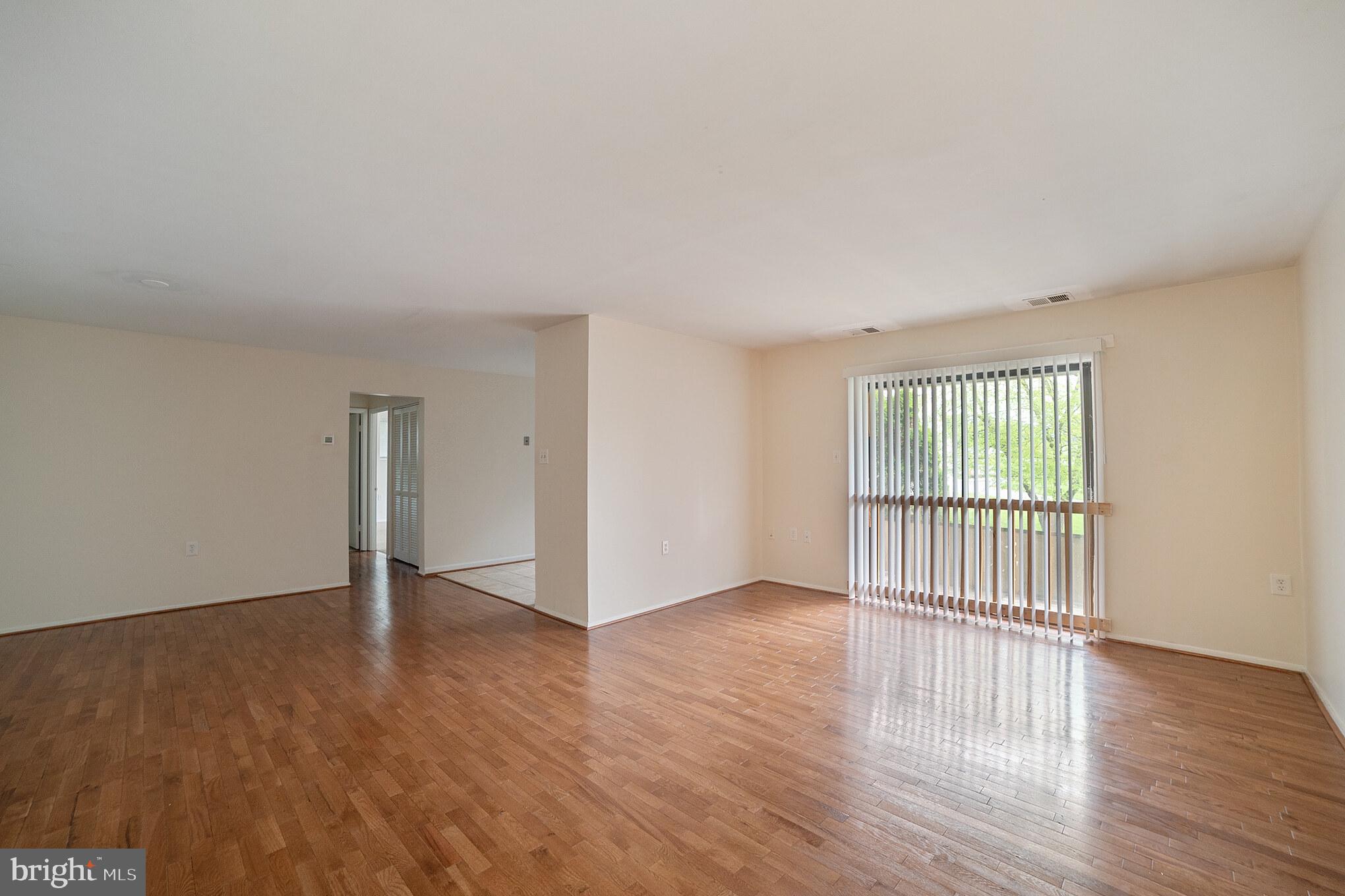 Everything like brand new!! Available for immediate move-in and located in the last building of this small, quiet, garden style condo complex. Great location a 3 min drive to Old Court metro. Hardwood floors throughout living area, open floor plan, lots of natural light. Modern kitchen with newer counter tops, stainless steel appliances, and in unit washer and dryer. Both spacious bedrooms have lots of closet space, master bd has an en-suite, and private wooded views.
