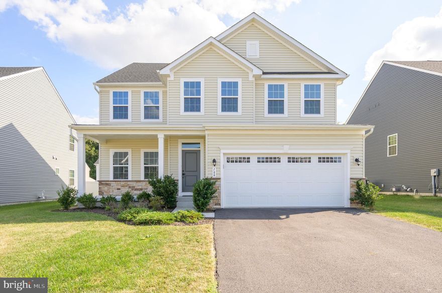 Step into comfort, style, and space in this beautifully designed home with over 3,600 sq ft of living area. Just 3 years young, it offers a perfect blend of modern finishes and thoughtful design. You'll love the open floor plan that flows into a gourmet kitchen featuring quartz countertops, 42” espresso cabinets, a gas range, a bonus wall oven, a walk-in pantry, and a reverse osmosis water system. Entertain effortlessly in the family room with a custom media wall made for your 80” TV, or enjoy the two versatile flex rooms ideal for a home office, playroom, or gym. The spacious primary suite features two walk-in closets and a luxurious ensuite bath with double sinks, a tiled shower, and a soaking tub. Three additional large bedrooms, a hall bath, and a laundry room complete the upper level. The finished basement adds even more room to relax or host guests, along with a third full bath and custom-lit storage space. With energy-efficient systems, a 2-car garage with EV charger, and a level backyard complete with a vinyl deck and robotic mower setup, this home truly has it all. Tucked on a quiet street near a playground, dog park, and walking path, yet close to shops, restaurants, and major roads — this is the lifestyle upgrade you've been waiting for.