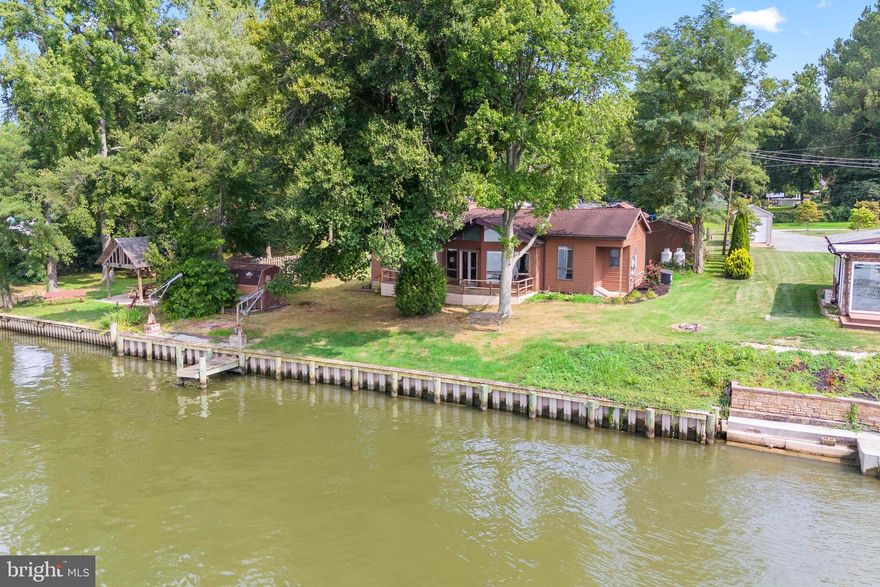 BACK ON THE MARKET! Waterfront along the Elk River. Enjoy full time living in this cute cottage. Roof was new in 2013 and is a 35 year roof, the bulkhead was new in 2018 and is a 50 year bulkhead with a short pier.  House is 2 bedrooms with a Den and 2 baths.  Situated on just under 1/2 acre and adjacent to the community lot, so only one neighbor, this is a little slice of paradise. 
Heat is Oil Fired Hot Water Baseboard and A/C is a split unit. The property does have a Whole-House Generator.  House has beautiful views of the Ships and Tugboats as the enter and leave the Canal.  
Come and make this one your own!