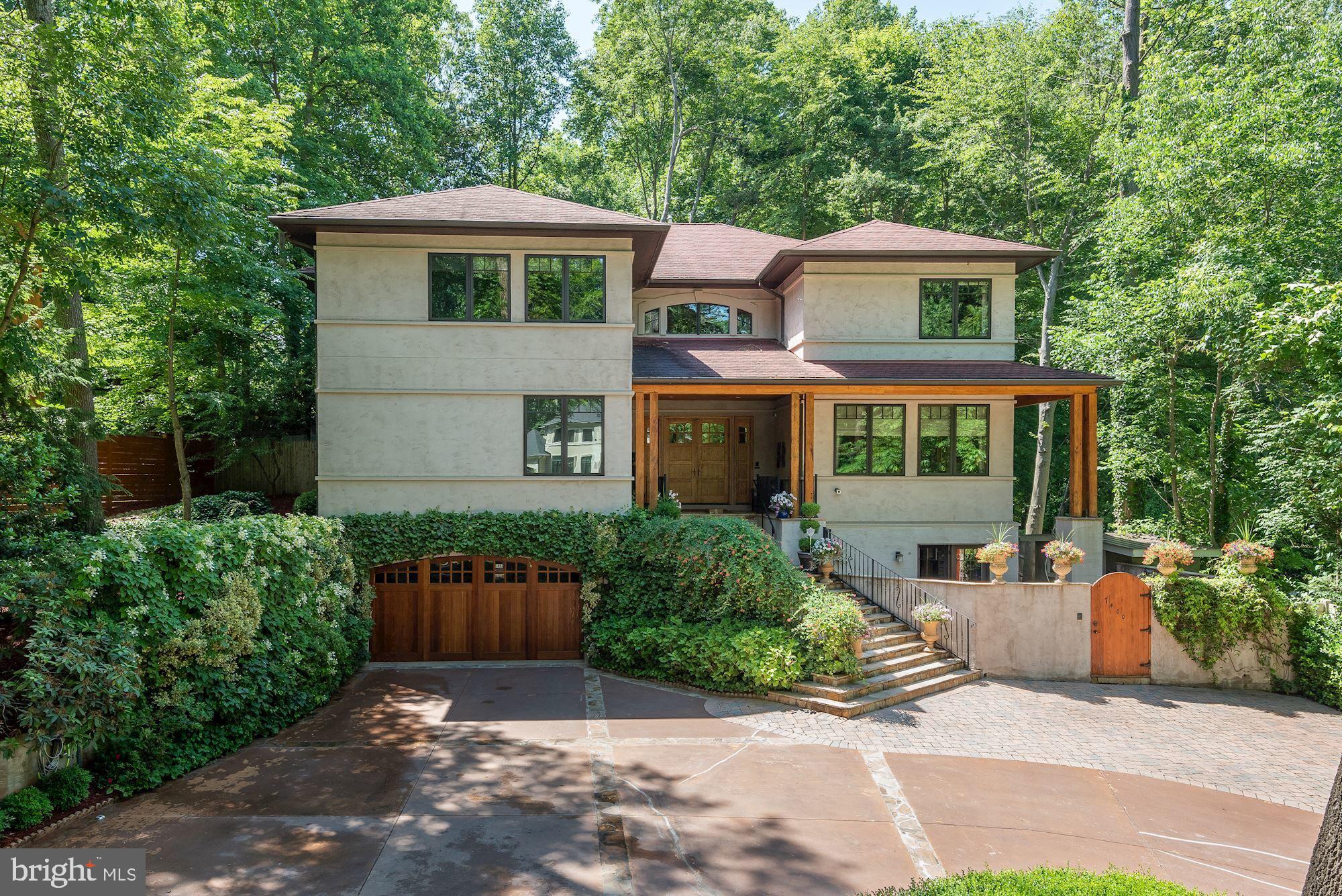 Welcome to 7400 Nevis Road, an incredible custom-built home in coveted Bannockburn. Showcasing 6 Bedroom Suites, 6 Full Baths, 2 Half Baths, and an Elevator, this sensational residence spans approximately 7,800 finished SF throughout 4 floors. Exquisite sight lines, gleaming reclaimed hardwoods, custom millwork, and quality finishes adorn each room of this remarkable home. Each space is expertly designed to encompass impeccable scale, perfectly placed windows, and high ceilings. Situated on a 0.46-acre lot in Bannockburn, the outdoor oasis is truly impressive with multiple entertaining areas and an outdoor built-in kitchen adjacent to the screen porch. The landscaped grounds are lined with mature hardscaping, a selection of greenery and blooms and a newly installed wood fence. Mature trees anchor the backyard and provide tranquil shade and privacy on sunny days. There is a circular driveway with plenty of extra parking and an attached 2-Car Garage.
Bannockburn is a park-like neighborhood in Bethesda that is ideally located inside the Beltway. Filled with spacious lots and unique homes, Bannockburn offers privacy and tranquility at home while still being conveniently close to local parks, golf courses, and commuter routes. There are plenty of opportunities to enjoy the outdoors with famous Glen Echo Park, Palisades Pool, and Cabin John Regional Park that is just minutes away.
