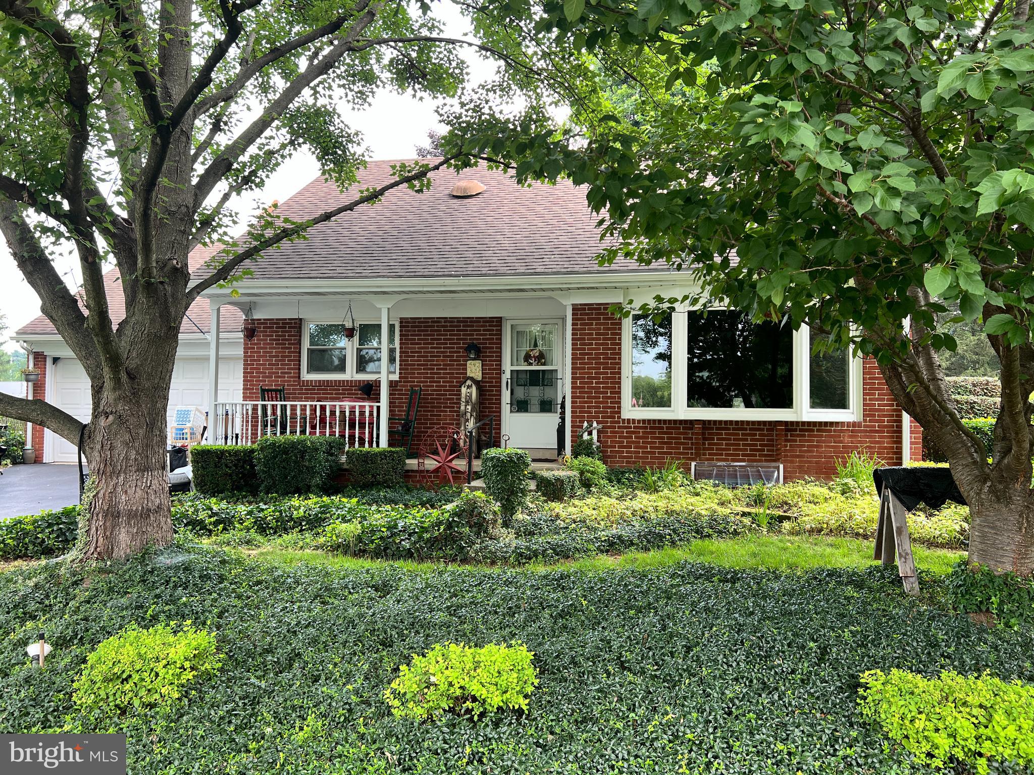 This property will be offered at Public Auction on Thursday, September 11, 2025 @ 6pm. The listing price is the opening bid only and in no way reflects the final sale price. 10% down due at auction, 2% transfer tax to be paid by the purchaser, real estate taxes prorated. This brick home sits in a quiet residential neighborhood and offers convenient access to community parks, downtown Manheim, and Route 283. The first floor hosts a cozy living room with a propane fireplace, a kitchen, formal dining room, a bedroom, a full bathroom, and a dedicated laundry area. The second floor features two additional bedrooms and another full bathroom. The partially finished basement boasts a family room, powder room, a large storage room, and a mechanical room. Additional amenities include an attached 1 car garage, a brick patio, and a well landscaped yard.