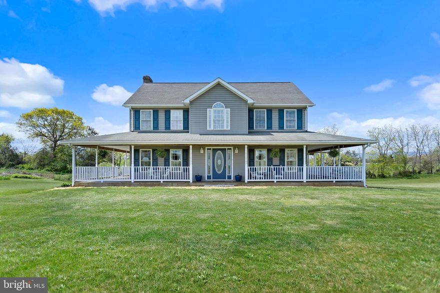 15+ acres of picturesque countryside living, complete with a two-story home featuring a wrap-around deck, ideal for soaking in sunrise to sunset views. Positioned to capture vistas of both mountain ranges, this property boasts a harmonious blend of open pasture and wooded areas, with minimal covenants ensuring the freedom to indulge in farming, gardening, and more. Inside, hardwood floors adorn the main level, comprising a cozy living area, elegant dining space, well-appointed kitchen with breakfast nook, laundry facilities, and a convenient half bath. Upstairs, the expansive primary suite beckons with a walk-in closet and full bath boasting a luxurious soaking tub, accompanied by two additional bedrooms and another bath. The lower level, houses utilities, including an oil furnace, separate wood furnace, a 400 amp service, and a walk-out basement offering easy access for future workshop endeavors.  This much acreage in a private country setting near town, with views is a rare find in the Edinburg-Woodstock locale. Don't miss out on the opportunity!