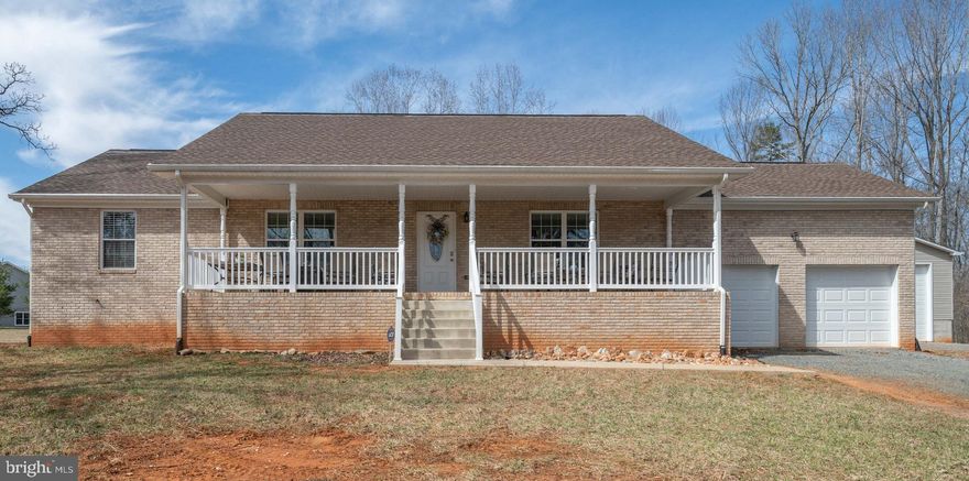 This all brick ranch style home was to be their forever home until things changed for the owners. The well-thought-out home has a fabulous front porch to soak in the beautiful days, a stamped concrete patio out back for outdoor dining, and a spacious lot to plan your garden plot and outdoor hobbies.  The 35 x 45 detached car-barn/shop with 16' ceilings is a rare find and a real treasure!  This provides an overflowing amount of storage and endless uses.  (2)  8 x 8 doors, (1) 8 x 10 door and (1) 14 x 10 door.  Includes a 30 Amp RV plug. The home offers easy living with the kitchen, dining, and living room open into one another and all-porcelain tile floors.  The kitchen has upgraded cabinets, granite counters, and stainless steel appliances. The owner's suite offers his and hers walk-in closets and a private bath with a large shower. 2nd bedroom and guest bath wrap up the main level.  The 3rd bedroom, recreation room and laundry on the lower level provide guests with their own space.  PS-The Owens Corning basement finishing system has a lifetime warranty with it.  Owners have buried downspout extensions to daylight away from the house.