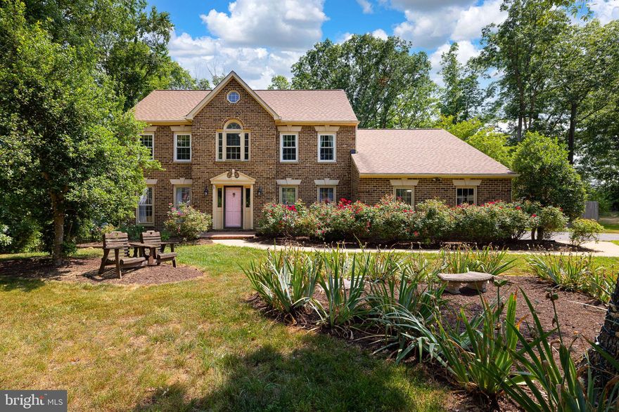 This gorgeous brick colonial with a pool is ready for new owners! 
This stunning home sits on a corner and a cul de sac with a great lot & landscaped exterior with an inviting pool for summer enjoyment! Enjoy the beautiful floors throughout, wainscoting & wood trim details, a spacious kitchen with granite & stainless appliances and picturesque bay window, family room with beautiful brick fireplace & gas logs, enormous pantry with second fridge & washer/dryer, and generously-sized formal living and dining room. Upstairs is an expansive primary bedroom with updated luxurious en suite, 3 additional spacious bedrooms with another beautifully renovated bathroom, and on the lower level you’ll find an additional 5th bedroom/guest space with walkout side entrance. 
This one is waiting for the perfect new owners! 
*Roof, Siding, Appliances, & Water Heater all under 5 years old!
Even better, this home is just .7 miles from the back gate! Get home to your personal oasis a little sooner!