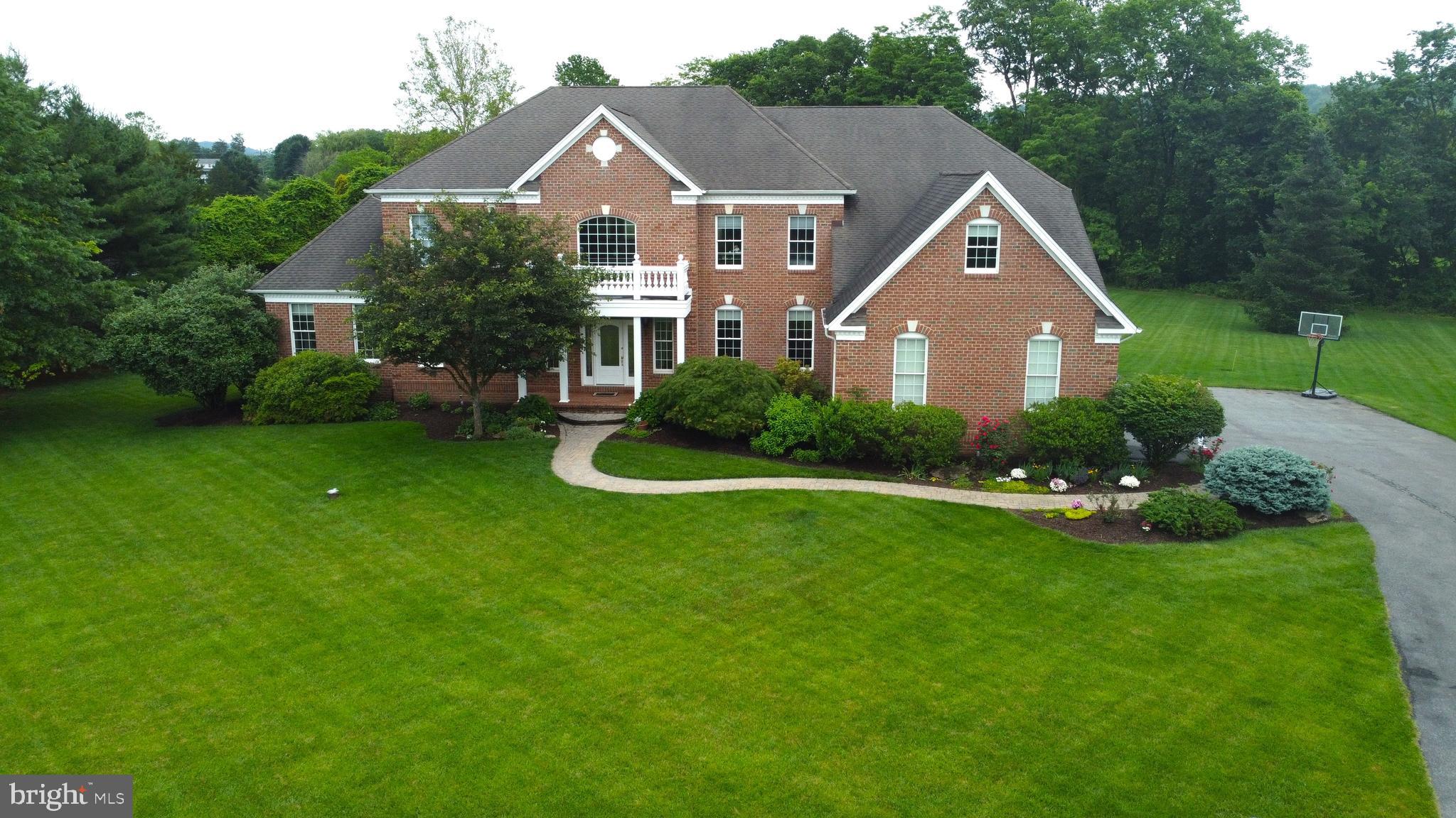 Stunning Country Estate in the prestigious Woodside Estates in Williams Township. Don’t miss this exceptional 4-bedroom, 4.5-bath home nestled at the end of a private cul-de-sac. Step into a grand two-story foyer flanked by elegant formal living and dining rooms, both featuring beautiful tray ceilings. The heart of the home is the soaring two-story family room which showcases a full wall of windows and a striking central marble fireplace. The expansive gourmet kitchen is a chef’s dream; it boasts Yorktown cabinetry, granite countertops, gas cooking, a double oven, walk-in pantry, oversized center island with seating, and a sunny breakfast area that opens onto a multi-tiered rear deck—perfect for entertaining. Beautiful 400 sq ft Sunroom/conservatory with views from the front to back of the house. A private study with custom cabinetry, first-floor laundry, and a well-designed mudroom complete the main level. Upstairs, you’ll find four generously sized bedrooms, each with its own en suite bath. The luxurious primary suite includes a tray ceiling, a private sitting area, a spa-like bathroom with walk-in shower, soaking tub, dual vanities, and separate his-and-hers water closets. Two massive walk-in closets (9x20 and 7x10) complete this retreat. This spectacular home is a must-see—easy to show! Join us for an Open House: Saturday (6/14) from 1–3 PM