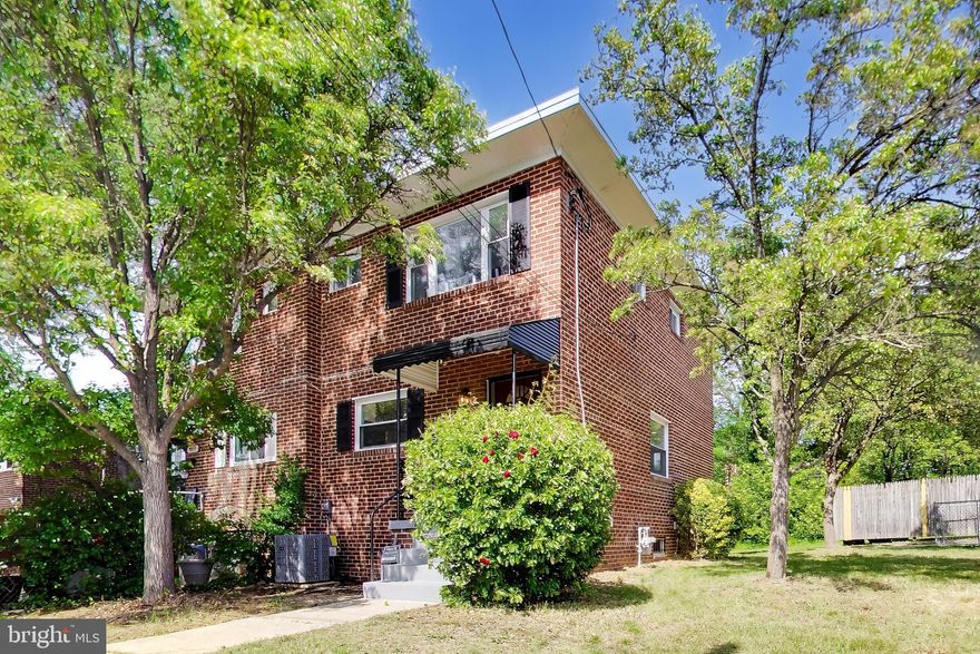 Discover exceptional value in Prince George’s County with this charming brick townhome, where
timeless character meets modern comfort across three beautifully finished levels. Warm hardwood
floors and abundant natural light create an inviting atmosphere from the moment you step inside.
The main level offers a bright, open living and dining area that transitions seamlessly into a thoughtfully
updated kitchen featuring crisp cabinetry, quartz countertops, stainless steel appliances, a stylish
backsplash, and a spacious island, perfect for family gatherings and effortless entertaining.
Upstairs, three comfortable bedrooms provide peaceful private retreats, complemented by a fully
renovated hall bathroom with clean, modern finishes, updated tilework, and contemporary fixtures.
The finished lower level provides even more living space, including a large recreation area, an updated full bathroom with a tiled walk-in shower, and flexible space ideal for guests, a home office, gym, or media room.  A separate basement entrance adds extra convenience and versatility.
Enjoy outdoor living with a deck, fully fenced yard, two-car driveway, and a spacious private green area perfect for relaxing, gardening, or hosting gatherings. Conveniently located near major commuter routes, shopping, dining, and National Harbor, this home offers the perfect blend of style, comfort, and convenience. Schedule your showing today!