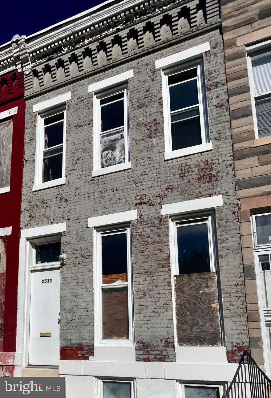 Baltimore shell — work has begun! Great opportunity to make your vision come true!  Property Sold AS-IS.