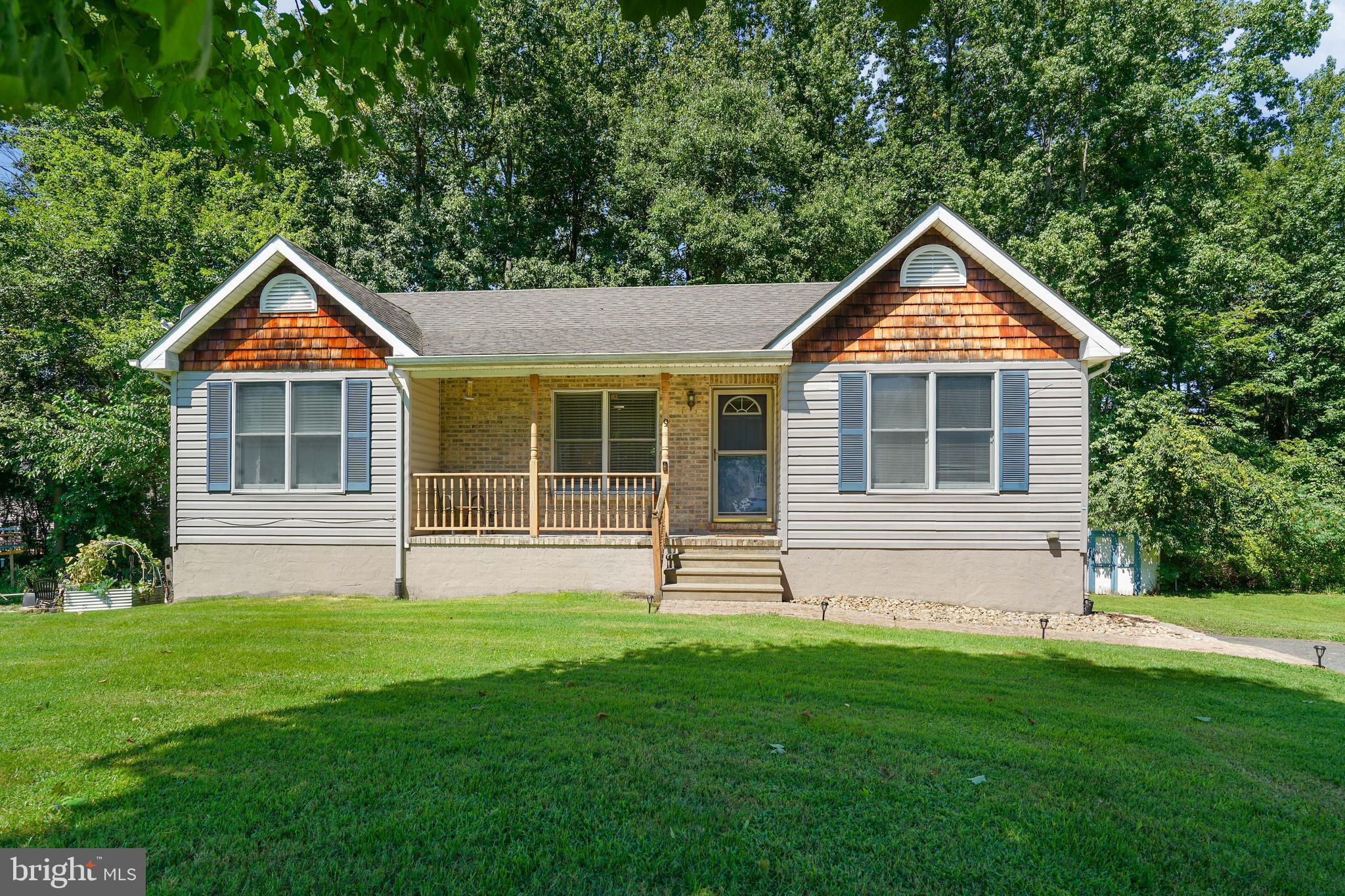 Welcome to this charming 3 bedroom, 2.5 bath rancher located in the highly sought-after water-oriented community of Kensington Courts! This home is situated on a cul-de-sac and is only a short walk or bike ride away from the community water access where you can fish, swim, or canoe in the Elk River. The main floor features a bright, open layout seamlessly connecting the living room, dining area, and kitchen. The master suite offers comfort and convenience with two closets and a private bathroom. The lower level offers a spacious a rec room with wet bar, half bath, bonus room, and laundry area. Whether you're relaxing on the covered front porch with your morning coffee, or entertaining a crowd on the rear deck - this home is sure to fit all of your needs! Feeds into Bohemia Manor middle & high (buyer to verify). Convenient to Rt 40, MD/DE line, Chesapeake City restaurants, and the C&D Canal Trail.