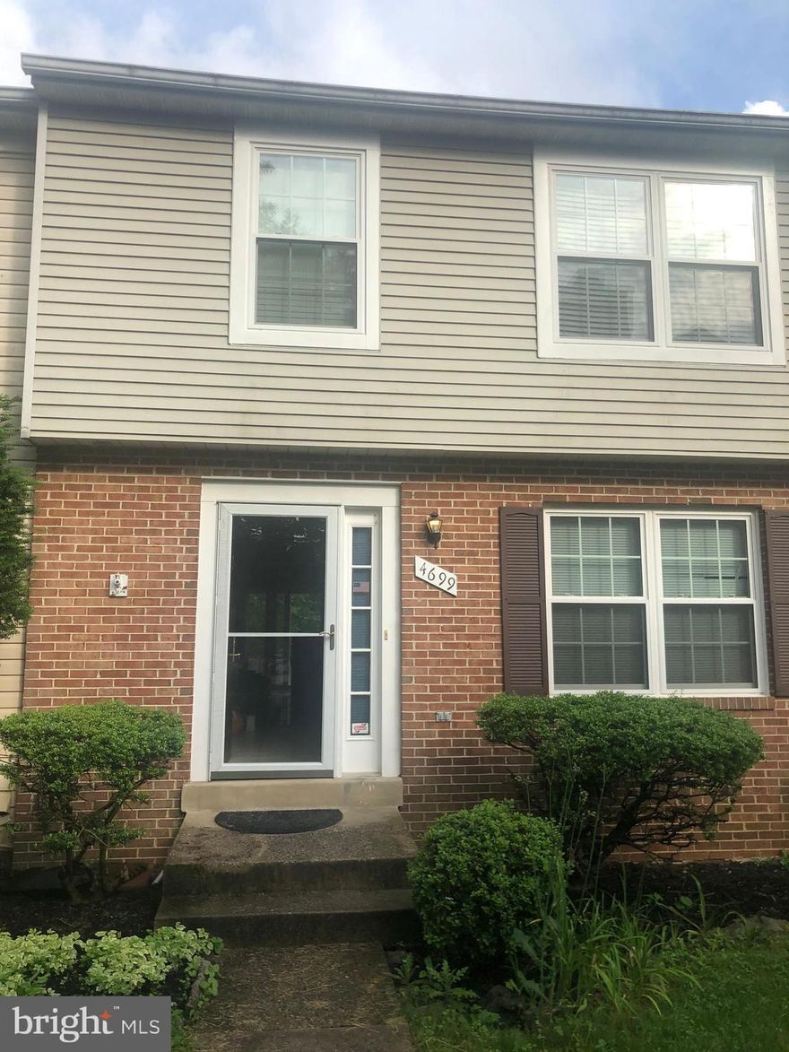 AIRY TOWN HOME WITH HARD WOOD FLOORING AND C ARPETING,  WINDOW IN KITC HEN, NICE BAC KYARD, SPACIOUS REC ROOM AND SEPARATE LAUNDRY AND STORAGE ROOM. Washer and Dryer, and Storm Door.