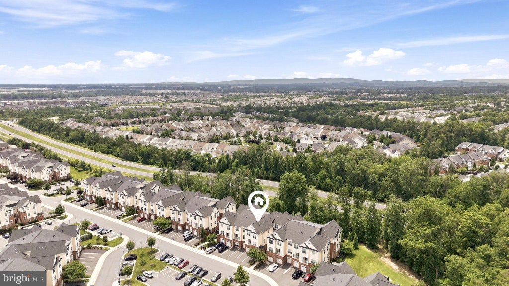 Photo of 23255 Milltown Knoll Square #107, ASHBURN, VA 20148 (MLS # VALO2130898)