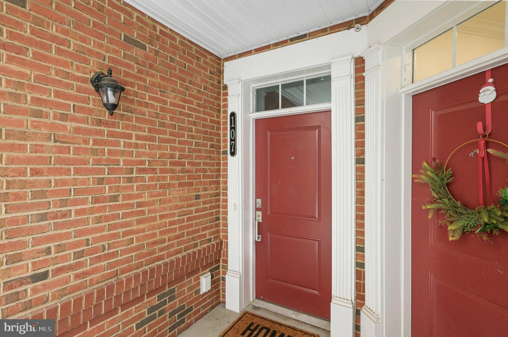Photo of 23255 Milltown Knoll Square #107, ASHBURN, VA 20148 (MLS # VALO2130898)