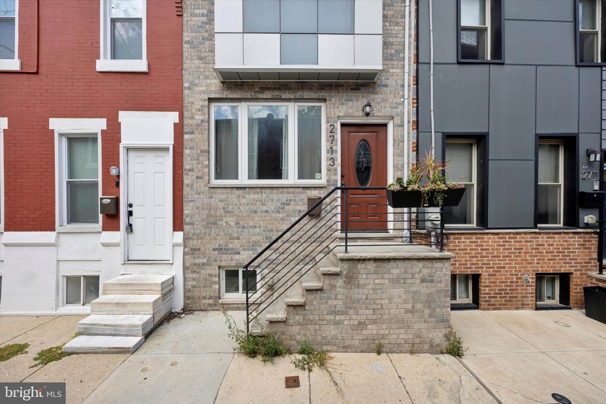 Welcome to 2713 Latona Street with the 10-Year Tax Abatement valid until 2029!
With 3 bedrooms, 2.5 bathrooms, and over 2,300 sq ft, this stunning home combines high-end finishes with modern convenience. It’s a true standout in Grays Ferry.
Step inside and you’ll immediately notice the beautiful hardwood floors flowing throughout the main living levels. The chef’s kitchen is a showstopper—designed with over 40 cabinets for ample storage, upgraded stainless steel appliances (including a Samsung Family Hub fridge), elegant floor tile, and a striking mosaic marble backsplash. The open layout with access to the back patio is perfect for entertaining, enhanced by 6 built-in Sonance ceiling speakers on the first floor.
On the second floor you'll find two oversized bedrooms and a lovely full bathroom. Ascend the stairs to the third floor where you'll find an expansive primary suite. The spacious bedroom includes walk-in closets stretching the length of the hallway, while the 170 sq ft master bathroom feels like a luxury spa—complete with a soaking tub, glass-enclosed shower with mosaic rock tile and waterfall shower, double vanity, floor-to-ceiling tile, and even an easily accessible washer and dryer.
The finished basement offers additional living space and a powder room—ideal for a media room, home office, or guest space. Other upgrades include brand-new roof by Seaglass Fiberglass, recently serviced plumbing and two-zone HVAC system, and insulation in the basement.
And then there’s the rooftop deck: 360° unobstructed skyline views that will take your breath away. Perfect for gatherings, sunsets, and city lights.
Plus, this location is conveniently nestled near Point Breeze, University City, Graduate Hospital, and Fitler Square. Just a short walk to parks or Center City or the Schuylkill River Banks Trail, with retail, dining, and neighborhood growth all around you.