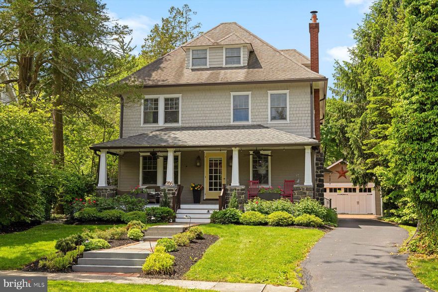 Welcome to this turn of the century Craftsman-style home situated on one of the prettiest streets located in the south side of the historic section of "walk-able" Wayne. From the moment you approach the brick and blue stone path, one will be captured by its charm and beauty. The open front porch invites you to come and relax and enjoy the peacefulness that 206 Lansdowne Ave has to offer. Built in 1900, just a few years after Wayne was incorporated into a suburban destination, this home exudes charm and character with all of today's modern conveniences. The current owner has meticulously upgraded and maintained this home to perfection. Upon entry, one is greeted by an open floor plan with a very "grand" staircases that circles up to the 2nd floor, but not before wrapping itself around a wonderful reading nook complete with gas fireplace and built window seats. The open Living Room, with additional built-in window seat flows nicely into a bright and spacious dining room with a view and access to the rear garden and the open-air kitchen. The kitchen has been completely redesigned with top-of-the-line VIKING appliances, large center island and custom white cabinetry complemented by rich dark stone counters. A rear entry features a laundry closet, a jewel box of a powder room and rear access to detached 2 car garage. One will feel like royalty ascending the main staircase that wraps around and up to the 2nd floor. The primary suite is complemented with a large walk-in closet, sumptuous marble bath, and a serene, glass enclosed sleeping porch with perfect views of the rear gardens. A 2nd bedroom with en-suite bath completes this level. The 3rd floor features 2 additional bedrooms with a Jack and Jill bath, reading nook and hidden storage room. If one so chooses, there is an additional back staircase down the first level. The entire property has been professionally landscaped with specimen plantings that will delight throughout the seasons. One enjoys this, both from in the inside through all the windows and even more so once in the yard. A beautiful brick and blue stone patio complete the backyard space, with direct access from the dining room, and is complete with built in BBQ grill, a brick, wood burning fireplace and ample seating and dining spaces. The rear lawn is spacious and could accommodate a pool. Basement is partially finished with outside access via a bilco door in addition to access to the mechanicals and good storage.
This home is not to be missed.