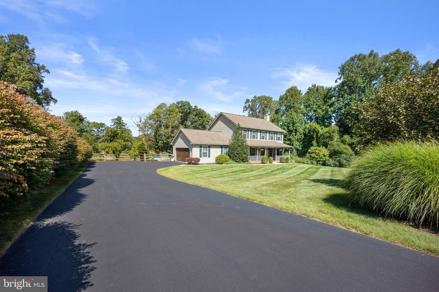 Welcome home to 142 Davis Road! This large center hall colonial lies in an agrestic setting on a flag lot of 1.4 pristine acres.  Upon arriving you'll notice the stunning curb appeal with a freshly seal coated driveway, contrasting beautifully with the deep green lawn, tasteful shrubbery, and brightly colored flowers.  The large, covered front porch, with stone spanning the entire width is a fantastic place to sit out at night with a drink or read a book. The back yard is enclosed by a split rail fence, and is totally private with surrounding hedges and trees. It boasts a centrally located swimming pool, babbling custom waterfall, a firepit area, and a patio directly off the back of the home--a perfect place to enjoy the outdoors with your guests, and ensure your home is, "the gathering place".  Additionally, the sellers are including a brand new stainless gas grill so you can immediately begin entertaining in your new bucolic oasis! The oversized garage just had a brand new automatic carriage house door installed for timeless aesthetic appeal and reliability for years s to come.  Upon entering, you'll notice immaculate, gleaming hardwood floors, natural stone fireplace, and traditional floorplan. There is a formal dining room and living room that flow seamlessly to the large, open kitchen, complete with an oversized pantry and powder room, just off the main hall.  Double French doors provide access to your rear patio, and a view of nature as you enjoy dining in the eat-in kitchen. Upstairs you'll notice the beautiful hardwood extends down the hallway and into the master bedroom,  complete with a massive ensuite bath, containing a closet, double vanity, walk-in shower, and a large soaking tub that overlooks the rear yard. The other oversized bedrooms are freshly painted, have had new, quality, neutral carpet installed, and are ready for your finishing touches. Upon descending to the home's lower level, you'll notice the basement is finished, has also been painted with new carpet installed, and offers a large space for a family room. There are two additional rooms on this level, one bedroom, and another "bonus" room that could be used as an office, gym, playroom, or even made into an additional bedroom. The open, unfinished portion of the basement  houses the home's systems and laundry, complete with a double utility sink for your convenience.  Lastly, there is a door with egress to the back yard, allowing for true, finished, lower level space. The Sellers recently installed a brand new hot water heater (2022), and new HVAC system (2022), so the new buyer will have no worries with respect to the home's main  systems. The meticulously maintained septic system was recently serviced and is in good, working condition. Lastly, as a final bonus, the home is being offered with a 1-year home warranty to ensure total buyer peace of mind. Schedule your showing today!