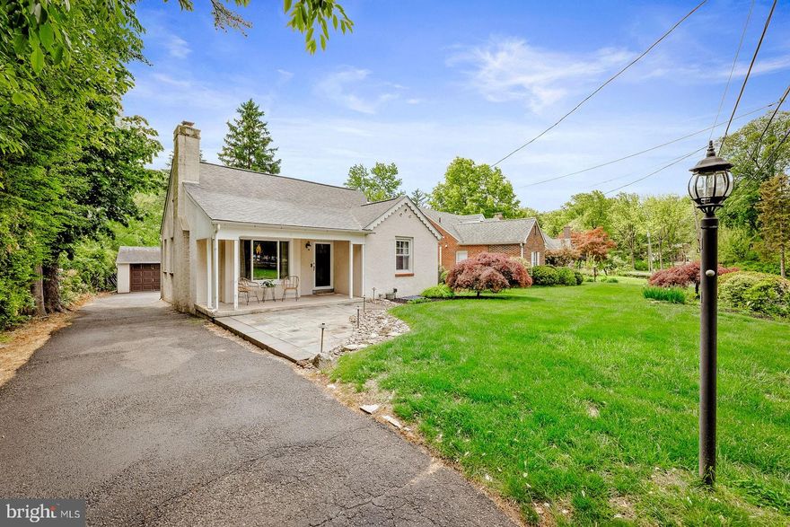 This charming Cape Cod home, built in 1949, offers a delightful blend of classic character and modern comfort. Step inside to discover a warm and inviting living room featuring beautiful wood flooring and a cozy brick fireplace, perfect for gathering with loved ones , while the bay windows fill the home with natural light, . The eat-in kitchen provides a welcoming space for family meals,  creating a bright and airy atmosphere with exit to rear covered porch overlooking the well landscaped rear yard, a perfect place for morning coffee. The property boasts three spacious bedrooms and a completely remodeled custom tile full bathroom, ensuring ample space for relaxation. A full basement offers additional storage or potential for customization, catering to your lifestyle needs. Outside, the home is framed by lovely street lights, enhancing the neighborhood's charm. The level lot, spanning 0.12 acres, provides a manageable outdoor space for gardening or enjoying the fresh air. The covered front porch and newer hardscaped front patio provide additional outdoor entertaining space. A detached garage adds convenience, while an asphalt driveway accommodates additional parking. Located in the desirable Rydal community, this home is surrounded by a vibrant neighborhood that values connection and community spirit. Residents enjoy easy access to local parks, perfect for outdoor activities and leisurely strolls. The area is served by Blue Ribbon schools and essential public services, ensuring a supportive environment for all. This property is not just a house; it's a place to create lasting memories. Experience the comfort and warmth of home in this inviting Cape Cod gem. This home has newer heating and central air and comes with a one year AHS home warranty.