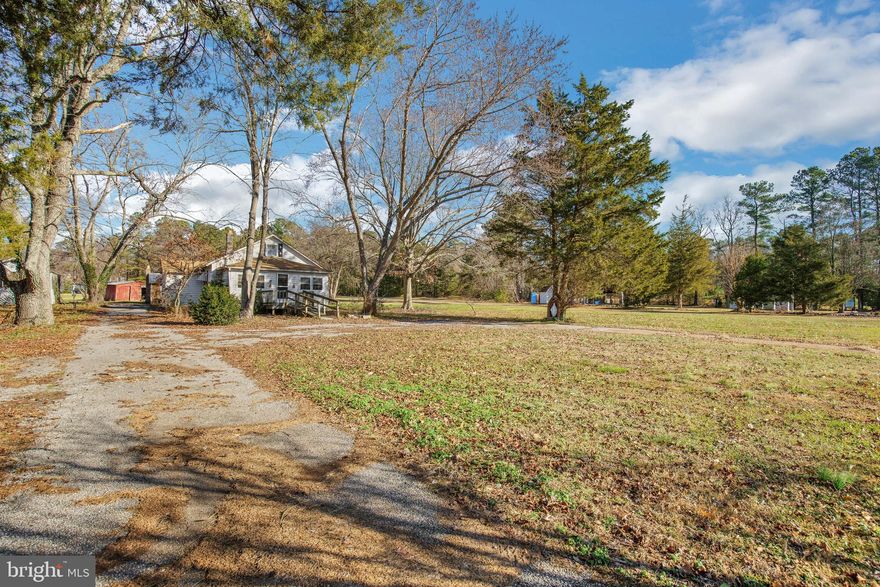 Long time residential property comprised of 4.56 acres with Agricultural Use and zoned Industrial.  Public water and sewer nearby and next door to a Industrial / Warehouse complex though it currently has a private septic and well. Directly on Route 5 south of Great Mills.  Has several storage barns and sheds for storage as well as the home on this property.