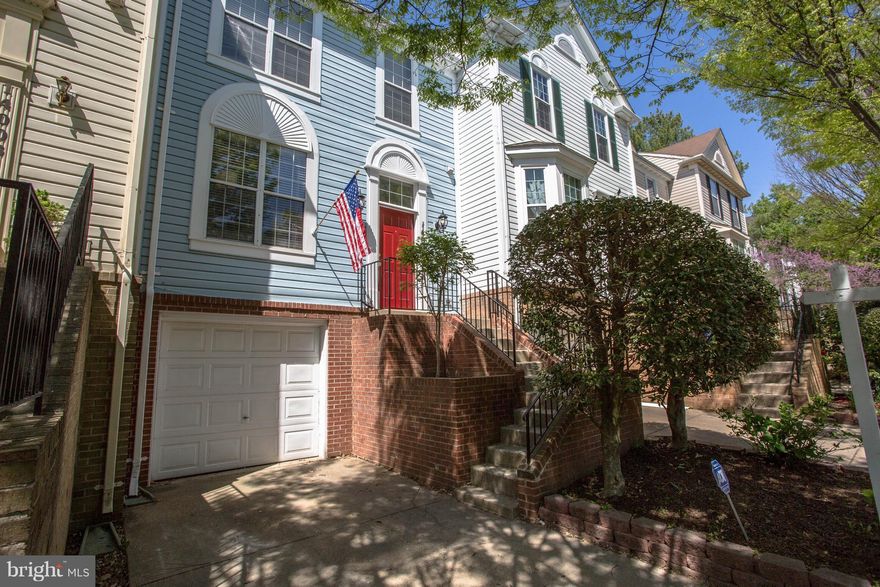 Renovated and located just minutes from the ICC, hurry and come see this move-in ready garage townhome.  The kitchen has been upgraded with a brand new stainless steel refrigerator as well as new granite countertops.  There is new beautiful flooring and paint throughout the home.  You will completely fall in love with this house.  This home will not last long!