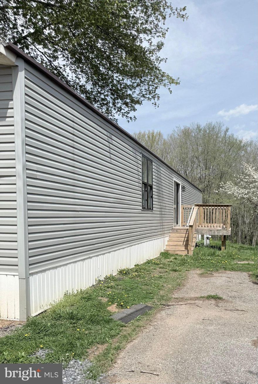 Well-maintained 3-bedrrom, 2-bath mobile home located in a quiet and convenient community in Finksburg. Built in 1989, this home offers a spacious and functional layout, featuring an expanded kitchen with ample cabinetry and room for dining perfect for everyday living and entertaining.
The bright living area provides a welcoming atmosphere, while the primary suite includes a private full bath. Two additional bedrooms offer flexibility for guests, home office or family needs.
Conveniently located near shopping, dining, and major commuter routes, this property presents a great opportunity for comfortable and affordable living.
Schedule you showing today!.
Property Sold AS IS.