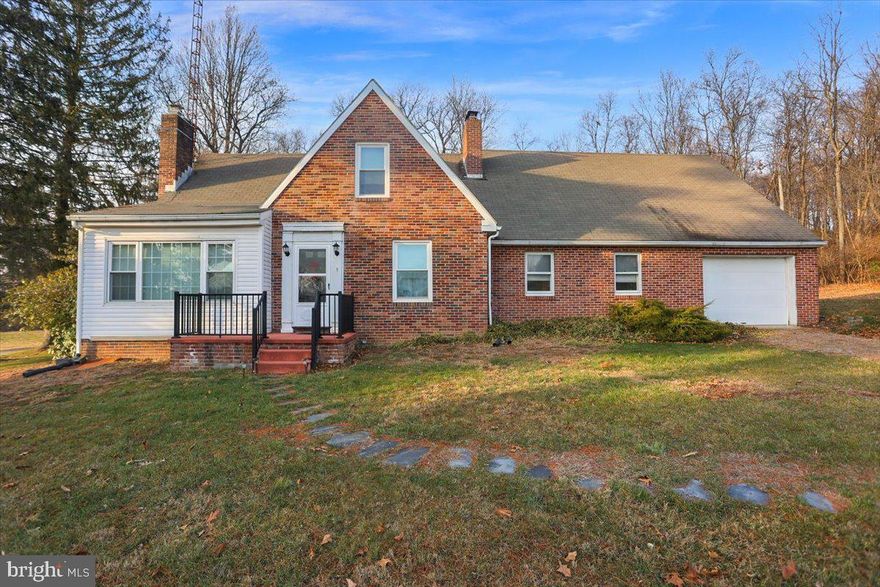 ***9.7 ACRES*** of woodland and pasture in Northeastern Schools, could be a farmette, with open space horses, goats, alpacas.  Great for a car collector or mechanic.  Amazing panoramic views from front of the property.   Also featuring 3 fireplaces, 2 on the main floor and one in the lower level to cozy up to in the winter months.
Featuring 4-5 spacious bedrooms and two and a half bathrooms,well loved and maintained.  Step inside to find a cozy yet spacious layout, with a large living area perfect for gatherings and an eat-in-kitchen that overlooks the serene, expansive property.  Upstairs, additional bedrooms provide flexibility for a home office, guest room, or hobby space. Outdoors, the HUGE 7 car detached garage offers ample space for vehicles, storage, and workshop. Surrounded by nearly ten acres of natural beauty, this home promises privacy and room to roam, making it an ideal retreat for those seeking country living without sacrificing comfort.  Whether you’re looking to relax, explore, or entertain, this Cape Cod gem provides the perfect backdrop.  ***BONUS***NATURAL GAS!!!