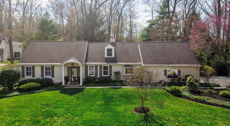 Located in Devon’s highly sought-after Shand Tract, 650 Timber Lane is a charming and thoughtfully expanded Cape Cod offering 4 Bedrooms and 3.5 Baths. This move-in-ready home seamlessly blends classic character with tasteful updates, all within a neighborhood celebrated for its vibrant social atmosphere and strong sense of community.
A welcoming Foyer accented by crown molding and wainscoting opens to rich hardwood floors that extend throughout the home. The formal Dining Room features custom built-ins, while the spacious Living Room with a gas fireplace flows into a beautiful family room highlighted by vaulted ceilings, skylights, and expansive windows overlooking the backyard. Just beyond, a flagstone Patio invites relaxed indoor-outdoor living.
The updated Kitchen offers granite countertops, a center island, custom off-white cabinetry, and a cozy breakfast area complete with a fireplace and bay window. The first-floor Primary Suite, appealing to a range of lifestyles, features a beautifully updated ensuite Bath with a walk-in shower, porcelain tile flooring, a double-sink vanity with polished black quartz countertops, and recessed lighting. Across the hall, a private Office provides flexible use and can easily serve as a fifth bedroom. A Powder Room, Laundry/Mudroom, and direct access to the garage complete the main level.
The second floor offers three additional spacious Bedrooms, all equipped with ceiling fans, along with a Full Hall Bathroom, a cedar closet, and attic storage accessed through the second bedroom.
The partially finished lower level provides wonderful recreation space with painted floors and walls and a drop ceiling with lighting. Generous in size, the area comfortably accommodates a sectional sofa, seating, a pool table, and more. A full Bathroom and multiple storage rooms add exceptional functionality, while a basement door leads outside via steps to the backyard.
Additional highlights include radiant heated floors, fresh paint throughout, and timeless plantation shutters.
Outdoors, the property continues to shine with a flagstone patio, large fenced rear yard perfect for activities, a dedicated lawn shed, and an attached side-entry two-car garage.
Ideally located within the top-ranked Tredyffrin���Easttown School District, and just minutes from downtown Wayne, Gateway Shopping Center, Whole Foods, Wegmans, the Devon Horse Show, and SEPTA Regional Rail, this home offers outstanding convenience for shopping, dining, and commuting.
** Please note  - Seller does not believe that the Square Footage number in the Public Record reflects the All Seaons Room. Buyer to verify.