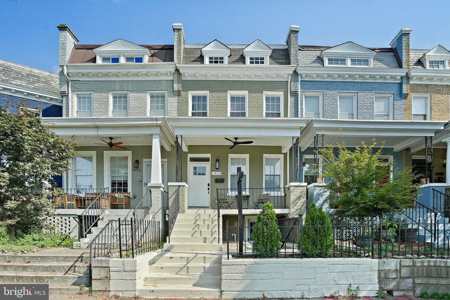 Every once in a while, you come across a life-changing home, one that carries a century of history yet feels freshly built for the way we live today. This 1917 Capitol Hill rowhome does exactly that. Behind its stately brick façade lies 2,808 finished square feet across three thoughtfully designed levels, complete with 4 bedrooms and 4.5 bathrooms. It’s a home where timeless character meets modern luxury, and the result is nothing short of extraordinary.

Step inside and the main level sets the tone. Sunlight spills across pristine hardwood floors, bouncing off elegant wainscoting and recessed lighting. The open-concept design creates effortless flow from living to dining to kitchen, making the space ideal for both everyday living and special gatherings. Anchoring it all is a chef-worthy kitchen, fully reimagined in 2024 with quartz counters, custom SANIBEL cabinetry, Bosch stainless appliances, and a spacious island that doubles as a prep hub and social centerpiece. A wall of glass doors connects the indoors to the outdoors, opening to a private deck overlooking a fenced yard and rare off-street parking pad—an urban luxury you’ll instantly appreciate.

Upstairs is where this home truly shines: two primary suites offer the kind of comfort and privacy that are hard to come by on Capitol Hill. Each suite features oversized windows, walk-in closets, and spa-inspired en suite baths complete with custom tilework, modern vanities, and sleek rain showers. The thoughtful design allows for flexibility—whether you prefer one suite as a serene retreat and the other as a luxe guest quarters, or simply enjoy the indulgence of having two true sanctuaries. A third bedroom and an additional full bath complete this level, along with the convenience of a laundry area updated in 2024. Throughout, hardwood floors and airy finishes tie the spaces together in effortless style.

The fully finished lower level adds even more versatility. With its own bedroom, full bath, and newly installed kitchenette (2024), this level can function as a guest suite, home office sanctuary, or income-generating rental. Two separate entrances and durable luxury vinyl plank flooring make the space adaptable, while still fully integrated into the home’s design.

Not to be overlooked are the capital improvements that bring peace of mind. The 2024 renovation delivered all-new HVAC with dual systems, updated plumbing, modernized electrical, and a fully waterproofed basement system. Behind the period-perfect architecture, every essential has been upgraded to today’s standards of comfort and efficiency.

The lifestyle here is as compelling as the home itself. Capitol Hill is one of D.C.’s most storied neighborhoods, where historic character meets an ever-evolving energy. Stroll over to Eastern Market for local fare, explore dining and coffee spots along Barracks Row, or spend time in nearby green spaces. Metro access keeps the entire city within reach, while the block itself retains that rare Capitol Hill blend of vibrancy and community charm.

What makes this home rare is the balance—it preserves its 1917 soul while embracing the best of modern design. The renovation didn’t erase its history; it elevated it. With dual primary suites upstairs, flexible living areas below, and finishes that inspire, this home redefines what it means to live comfortably on Capitol Hill.

This is more than a house. It’s an opportunity to live Capitol Hill at its very best—steeped in history, refreshed for the future, and ready to welcome its next chapter.
