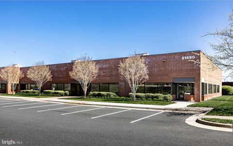 Photo of 21690 Red Rum Drive #182 & 192, ASHBURN, VA 20147 (MLS # VALO2119682)