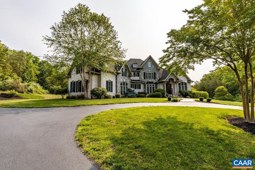 One-of-a-kind Estate Property on over 26 acres in Keswick. 4BR,4.5 BA Custom built home with a flex room that could easily be used as a 5th BR. Exquisite features and details throughout this home. Lots of trim, tray ceilings and beamed ceilings in the kitchen. Spacious kitchen with ss appliances, granite, tiled backsplash, dbl oven & gas stove. Several custom built-in bookcases, stone fp in family room, large granite basement bar with drop lighting and master bath with travertine tile & large glass panel shower. Master BR is on main level however there is a large 700sq ft bedroom with add'l room & bath for a Master Suite upstairs. Basement space easily used as a guest suite. Abundance of deck and patio space for entertaining. Fully stocked, private pond with shelter & dock for fishing, pedal boating and firepit. Professionally landscaped with sprinkler system with over 100 sprinklers. Wooded area can be used for atv or walking trails. Land in Land Use with tax incentives. Located close to CVILLE, just down the road from Keswick Club & Glenmore CC. Easy commute to MJ, UVA and Downtown Charlottesville. Agent/ Owner