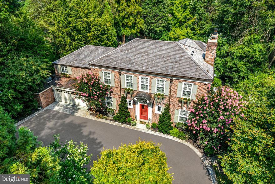 Absolute perfection! This North-side Haverford Walter Durham Jewel Box has been meticulously renovated over the past 5 years from top to bottom and is a rare find in the highly coveted Merion Cricket neighborhood.  Fabulous exterior  features include a new cedar shake roof with standing seam copper roof accents, new copper gutters and downspouts, new shutters and custom painted exterior trim, new driveway with Belgian block border and rumble strips, salt water pool and spa, restored brick patio, stunning landscape designs with specimen plantings and trees, all new exterior lighting, fully fenced backyard with restored stone retaining walls and new Marvin windows across the entire front and sides of the house. The sun-filled charming interior features gracious room sizes throughout with new site-finished and restored wide plank oak floors, stunning moldings, arched doorways, original built-ins and wainscoting, creamy Venetian plaster walls with Phillip Jeffries wall paper accents in the dining room, library and powder rooms, all new custom lighting, a spectacular expanded Bluebell kitchen featuring  creamy custom cabinetry, honed marble countertops with etch-proof sealant and reclaimed chestnut island, imported antique lighting fixtures from Lyon France, double stainless and antique brass La Cornue range, integrated Sub Zero refrigerator and freezer, a 100 bottle Sub Zero wine refrigerator, Wolf microwave, Waterstone hardware  Waterworks plumbing fixture,  breakfast room area with beautiful views of the private grounds, jaw-dropping great room with gas fireplace and two walls of windows looking out to the lawn and stunning  gardens and pool, gracious dining room with original restored moldings and gas fireplace, a charming library with original built-ins, all providing a wonderful open flow for relaxed living  and easy entertaining. The newly created mudroom offers lots of storage and easy access to the expanded 2-car garage and partially finished, dry basement. Yes, there's more!! Walk up the elegantly tucked, curved staircase to the second floor with features a breathtaking, spacious primary suite with a large bedroom offering three walls of floor to ceiling windows with remote binds, a gas fireplace, his and hers dressing rooms with plentiful custom closets and storage, a luxurious new primary bathroom with creamy cabinets, crystal hardware, Newport Brass fixtures, an oversized frameless glass marble shower, soaking tub and custom his and hers honed marble vanities with Visual Comfort lighting. The second and third bathrooms (one is a walk through and currently used as a second floor lounge) share a beautiful new custom tiled bathroom with marble basketweave flooring and white sub-zero shower tile. A hallway provides access to the renovated laundry area, large cedar closet and an expansive fourth bedroom with charming, renovated bathroom featuring a pebble floor, white pedestal sink and marble shower with frameless glass enclosure. Custom plantation shutters add to the clean, simple decor on both levels. The list goes on. Move right in and enjoy this impeccably designed and crafted property, in one of the most coveted neighborhoods on The Main Line, within easy walking distance to local and Amtrak trains, clubs, shopping, renowned schools, Suburban Square, Haverford, Bryn Mawr and more. A true treasure awaits its next lucky owners.
